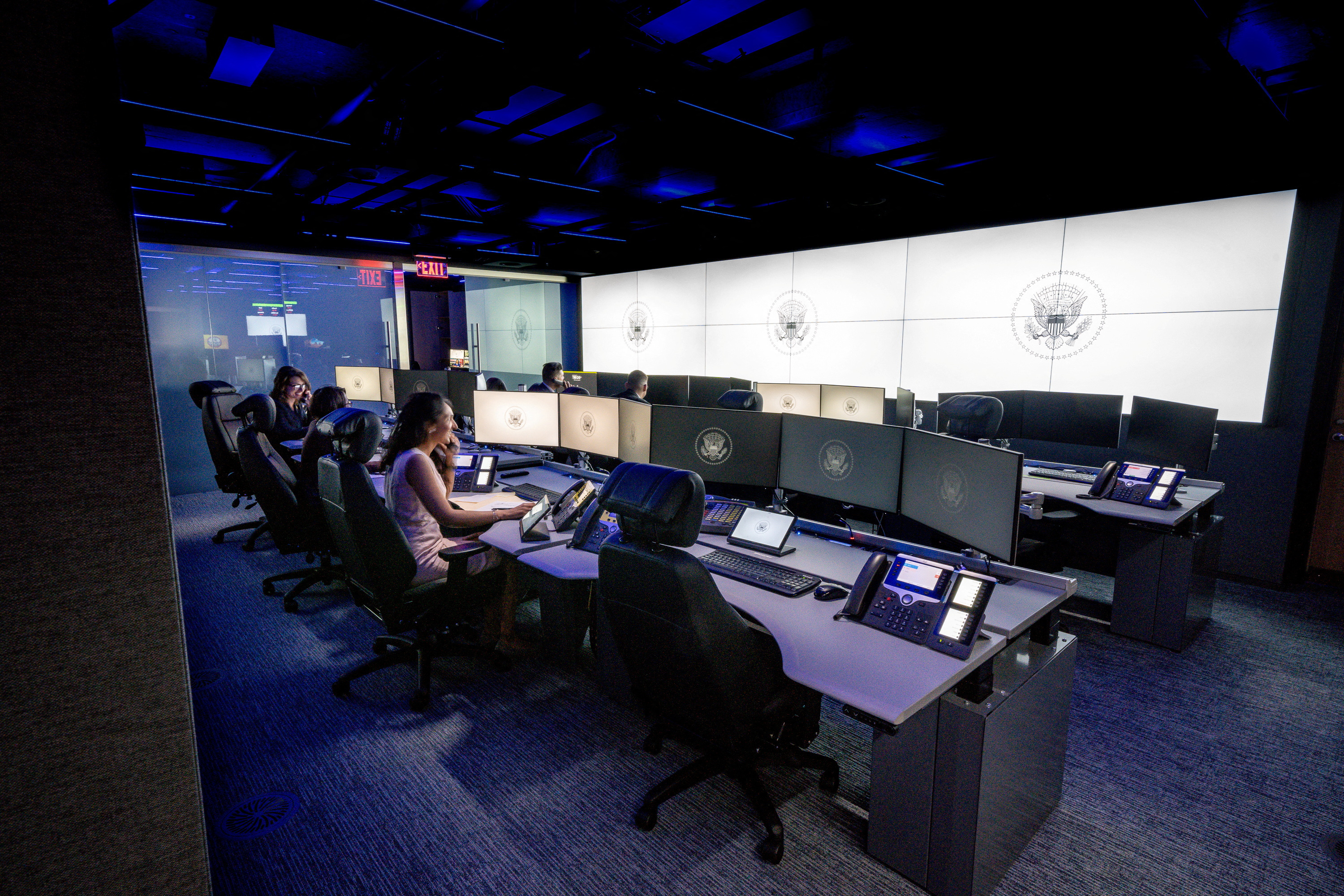 White House staff are seen seated in a part of the newly renovated White House Situation Room complex, in a White House handout photo taken in the West Wing of the White House in Washington. U.S. August 16, 2023. Carlos Fyfe/The White House/Handout via REUTERS