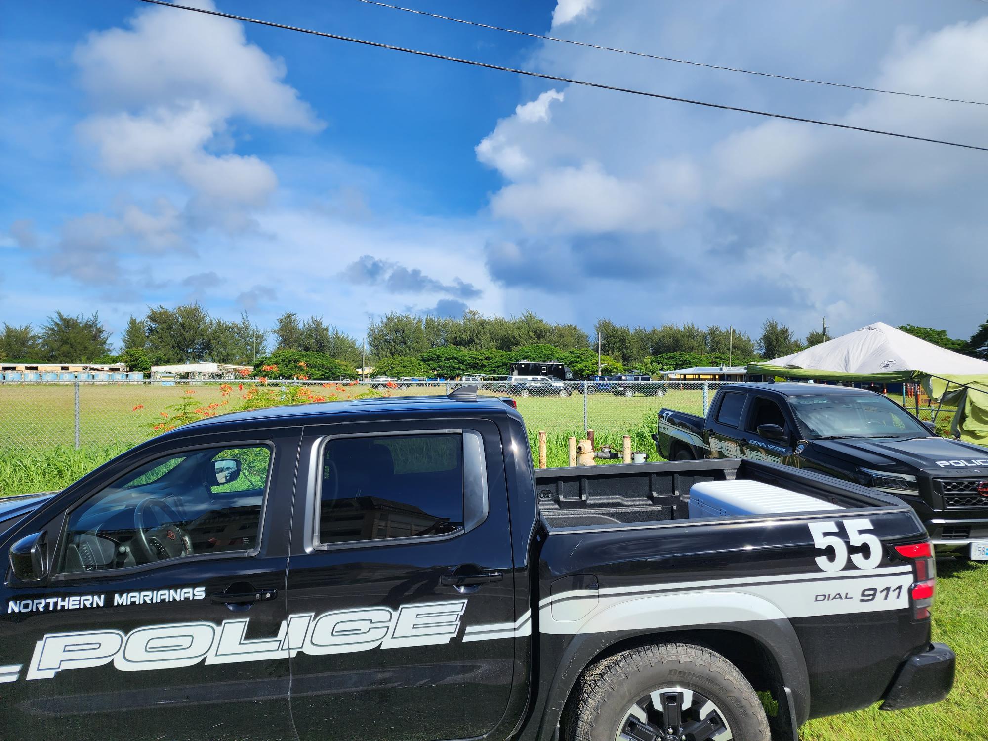 Police vehicles are seen at Hopwood Middle School on Monday morning.