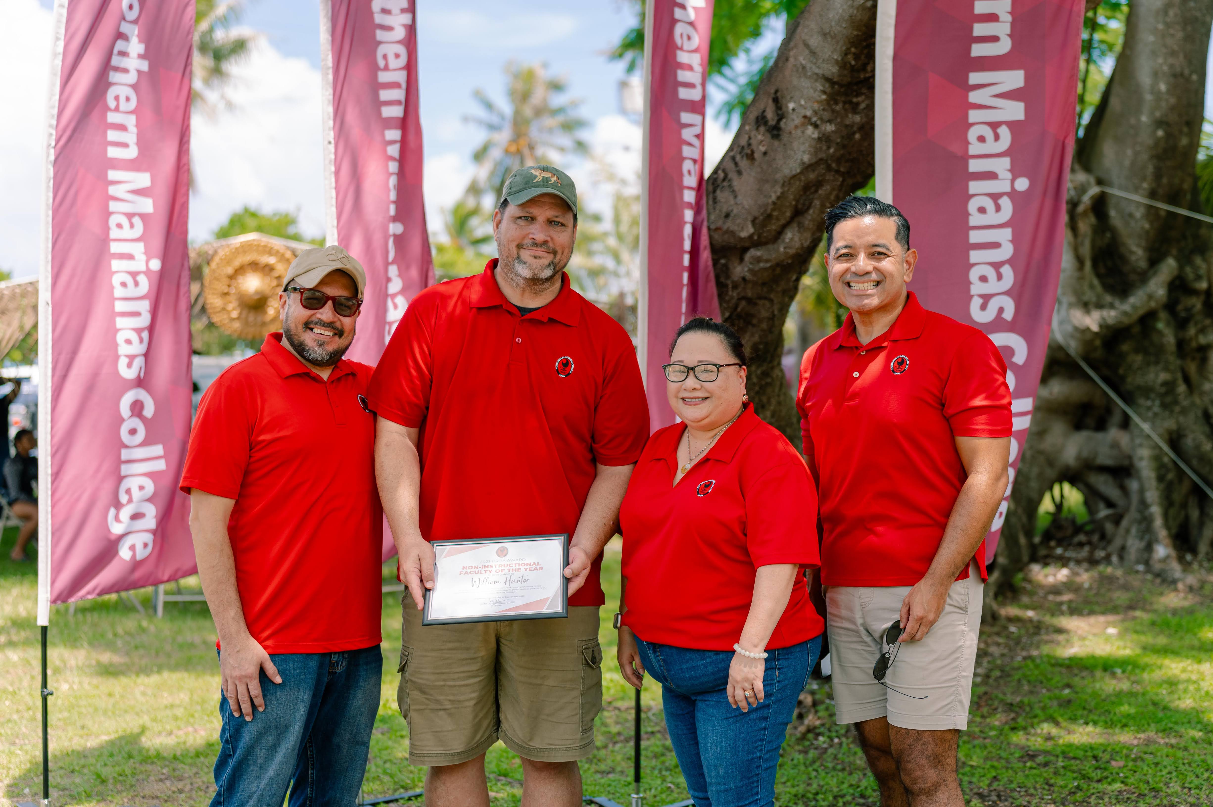 Non-instructional Faculty of the Year and Distance Learning Education Coordinator William Hunter with NMC President Galvin Deleon Guerrero, EdD, Interim Dean for Academic Programs and Services Lorraine Maui, and NMC Vice President for Administration and Advancement Frankie Eliptico.
