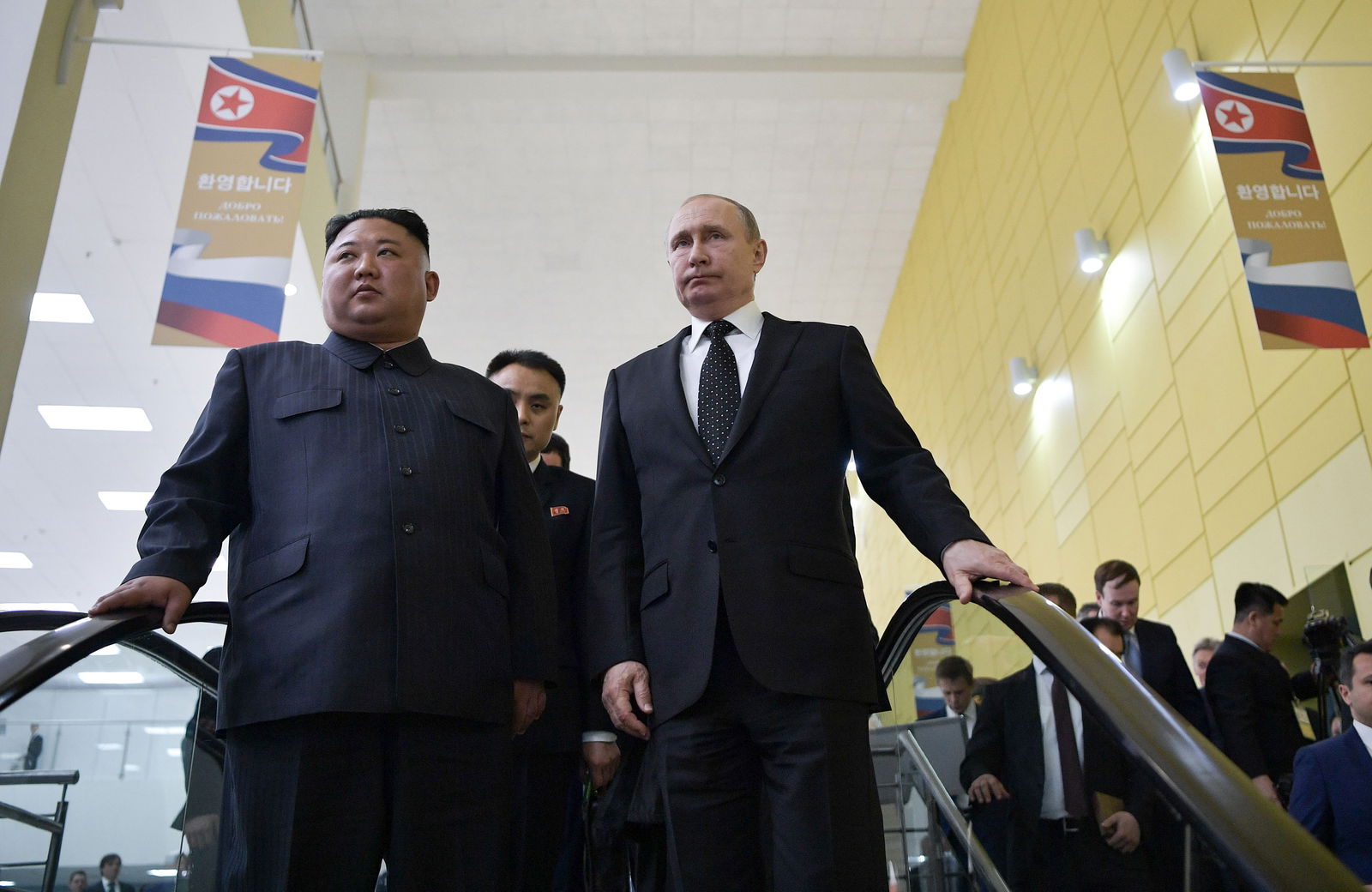 Russian President Vladimir Putin and North Korean leader Kim Jong Un ride an escalator following their talks at the Far Eastern Federal University campus on Russky island in the far-eastern Russian port of Vladivostok on April 25, 2019. (Alexey Nikolsky/AFP via Getty Images/TNS)