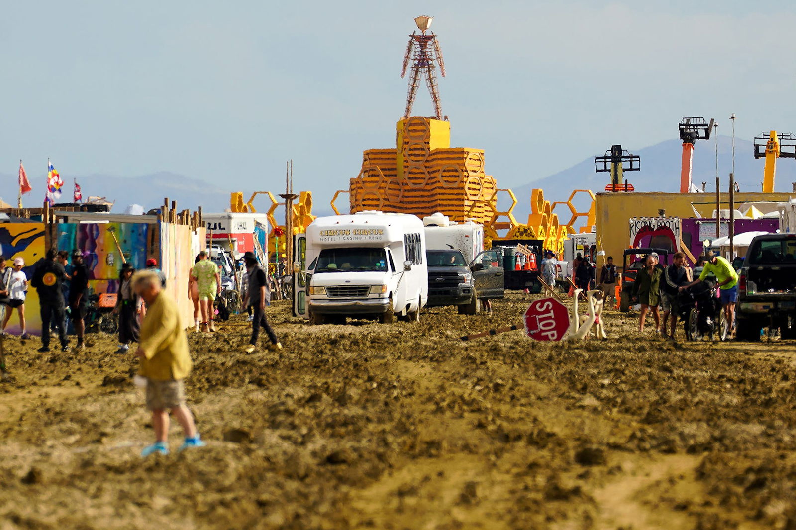 The Man structure, which is normally burned on Saturday night, looms over the Burning Man encampment after a severe rainstorm left tens of thousands of revelers attending the annual festival stranded in mud in Black Rock City, in the Nevada desert September 3, 2023. Trevor Hughes/USA Today Network via REUTERS.
