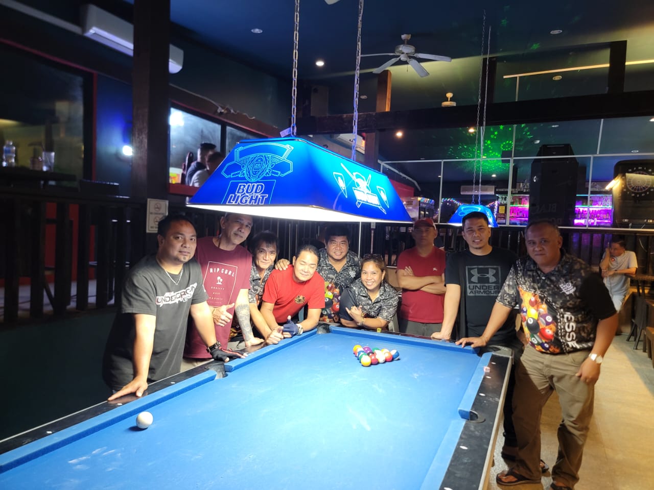 The Rendezvous Warriors and Black 8 Slayers pose for a photo after their game in the Tuesday division of the 2023 SBA Budweiser Open 8-Ball League on Tuesday at Black 8 Pool Bar.