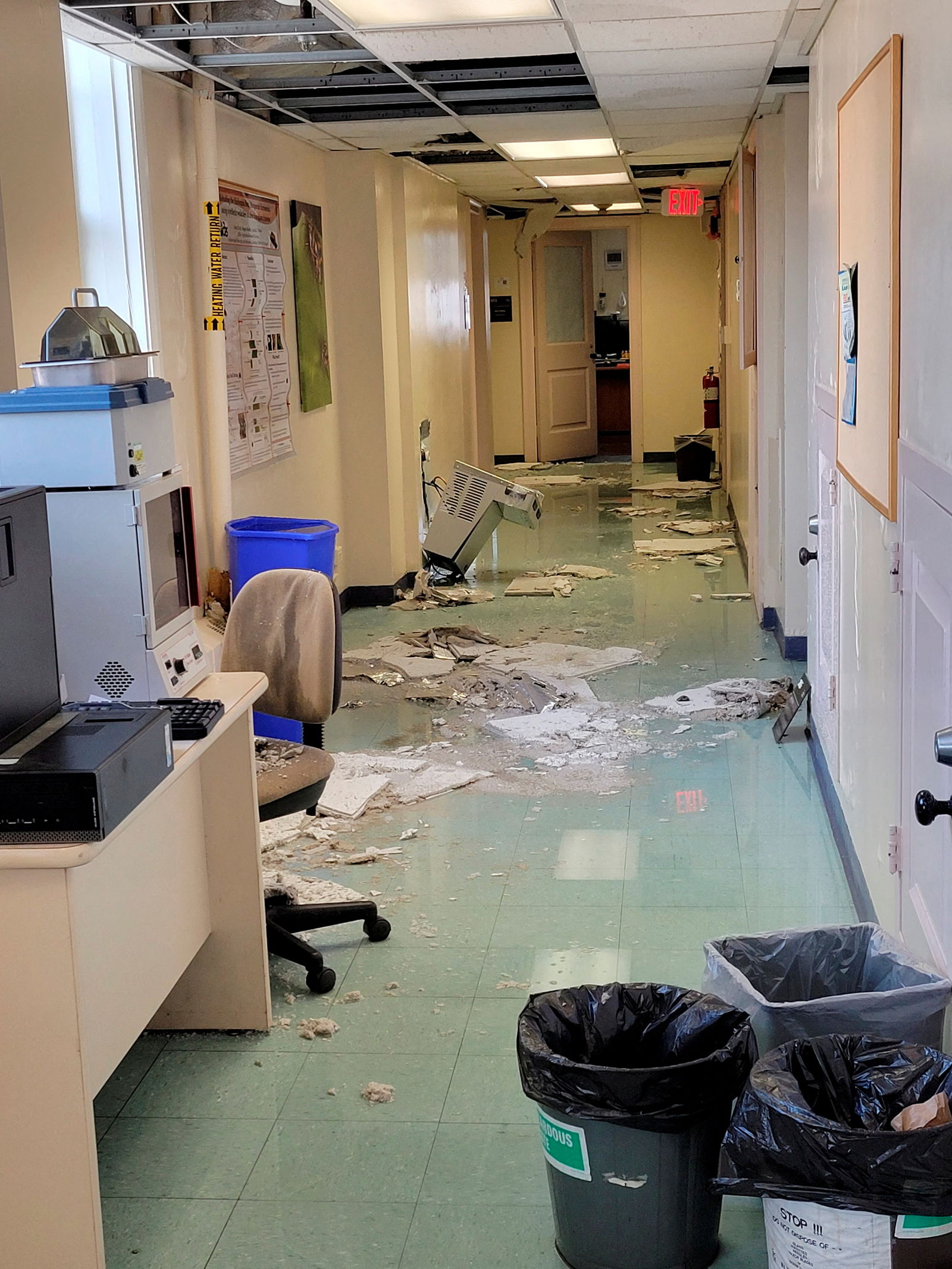 A damaged hallway in the U.S. Department of Agriculture’s (USDA) Beltsville Agricultural Research Center (BARC) is seen in a photo taken by an employee after a 2022 Christmas Day flood and ceiling collapses at the research facility, where employees have now filed whistleblower complaints over working conditions, in Beltsville, Maryland, U.S. December 26, 2022. 