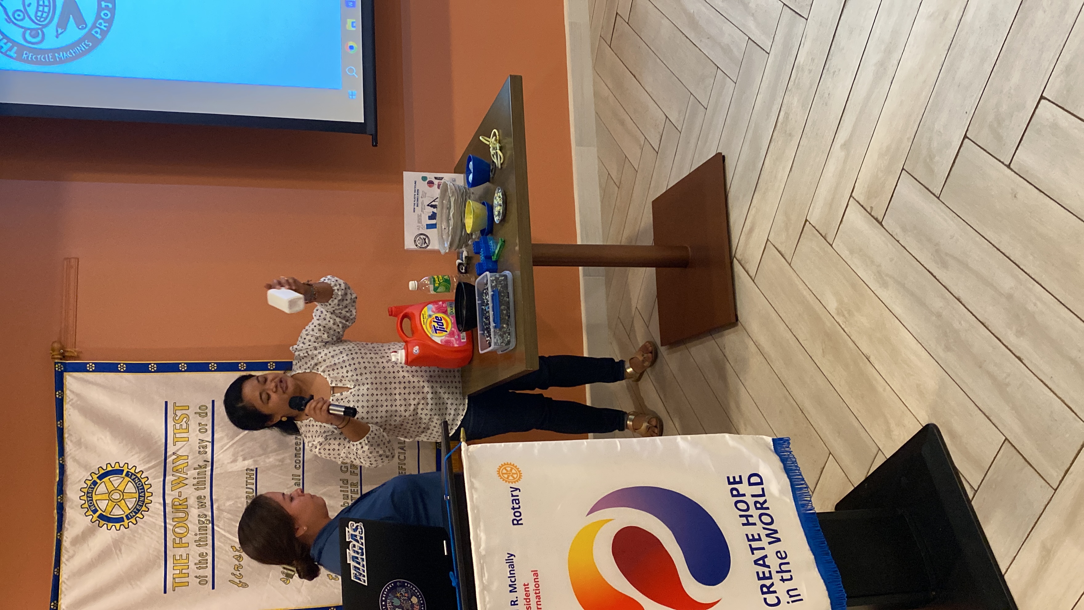 Jolly Ann Cruz, right, talks about recycling plastics during the Rotary Club of Saipan meeting at the Crowne Plaza on Tuesday, Sept. 12.