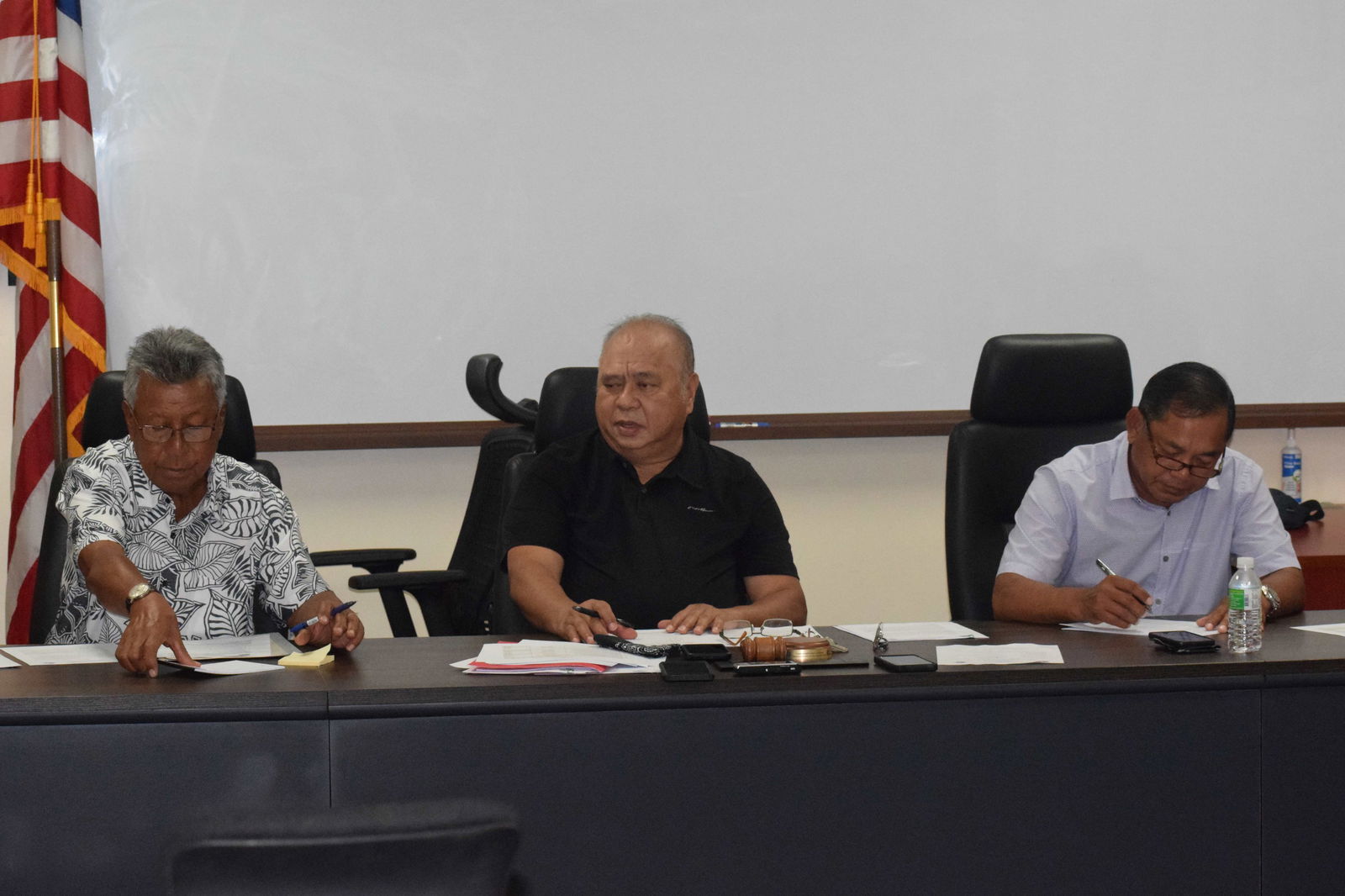 Commonwealth Casino Commission Chairman Edward C. Deleon Guerrero, center, with Commissioner Mario Taitano, left, and Vice Chairman Ralph S. Demapan attend a meeting in Gualo Rai on Thursday.