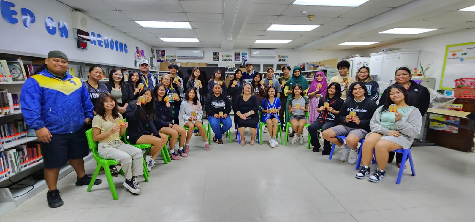 Senate President Edith Deleon Guerrero and her staff pose for a photo with Hopwood Middle School student leaders, PTSA President Jerika Laniyo-Peter, PTSA VP Mildred Ebuen, HMS Principal Victorino Borja, Vice Principals Karen Manuel and Dr. Ben Seman, and teacher Victoria Nishida.