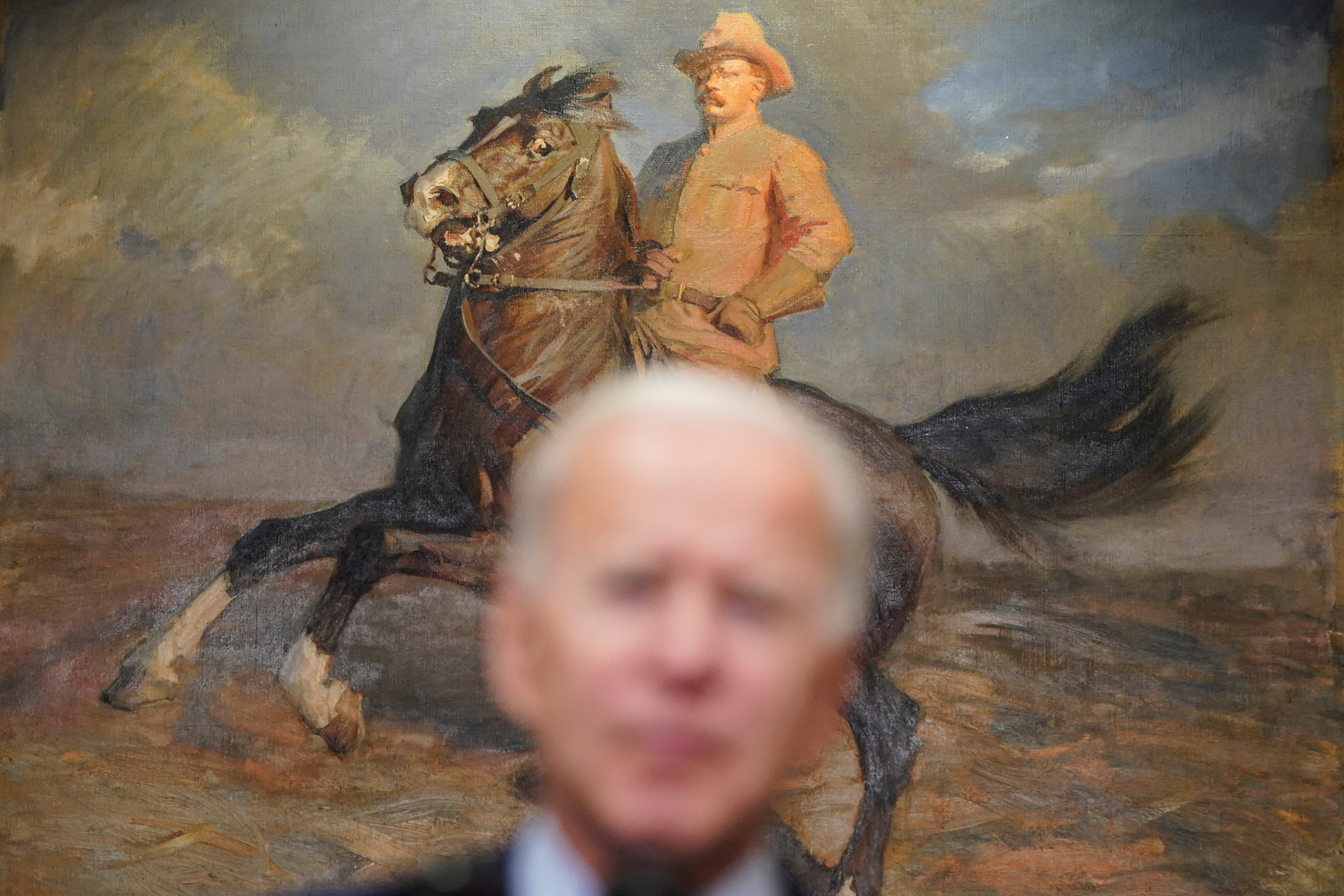 U.S. President Joe Biden speaks in front of a portrait for former President Theodore Roosevelt after the House of Representatives passed his $1.9 trillion coronavirus relief package in the Roosevelt Room of the White House in Washington, U.S., February 27, 2021. 