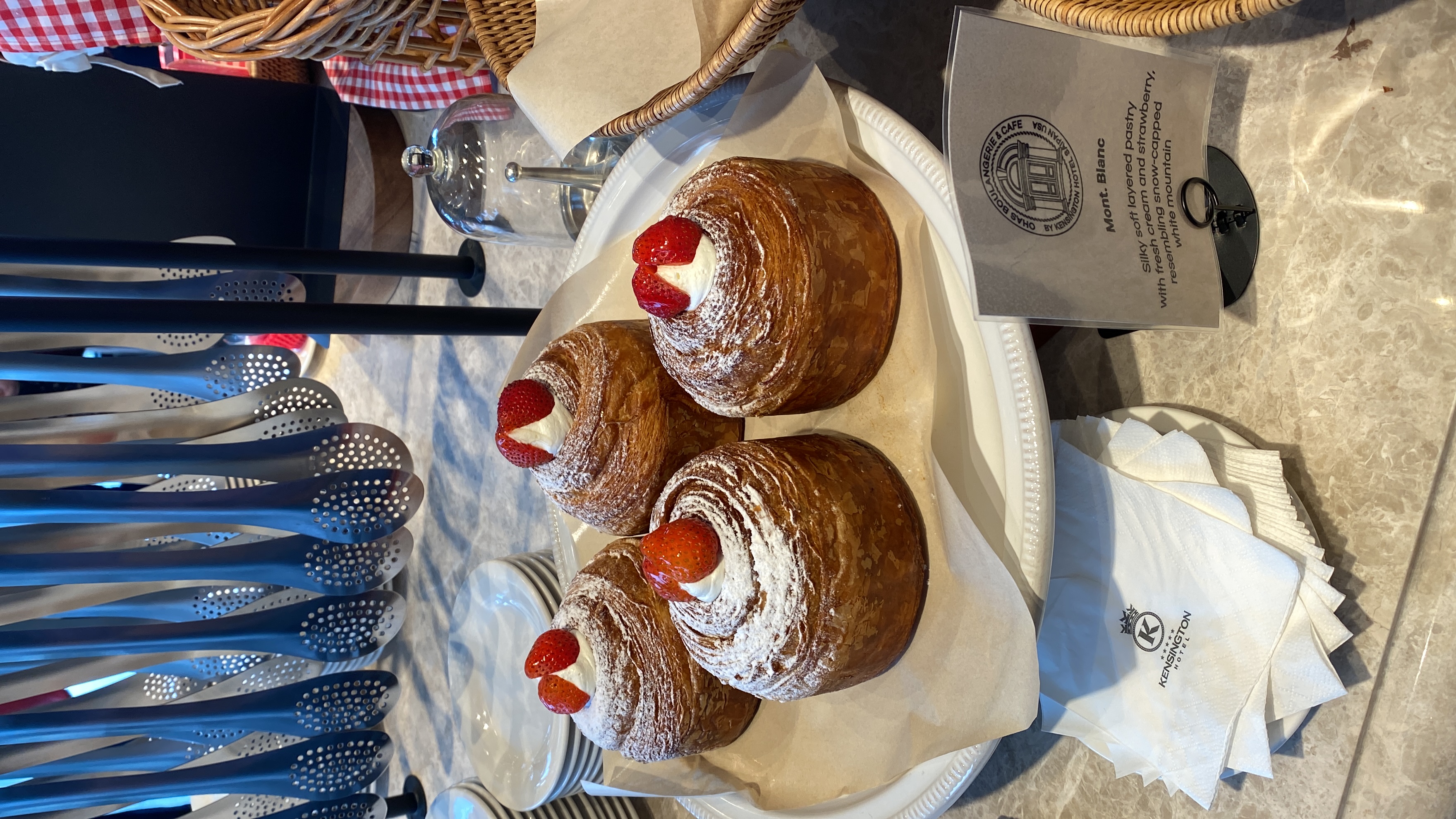 Ohas Boulangerie & Café Mont Blanc — a layered pastry with cream and strawberries.