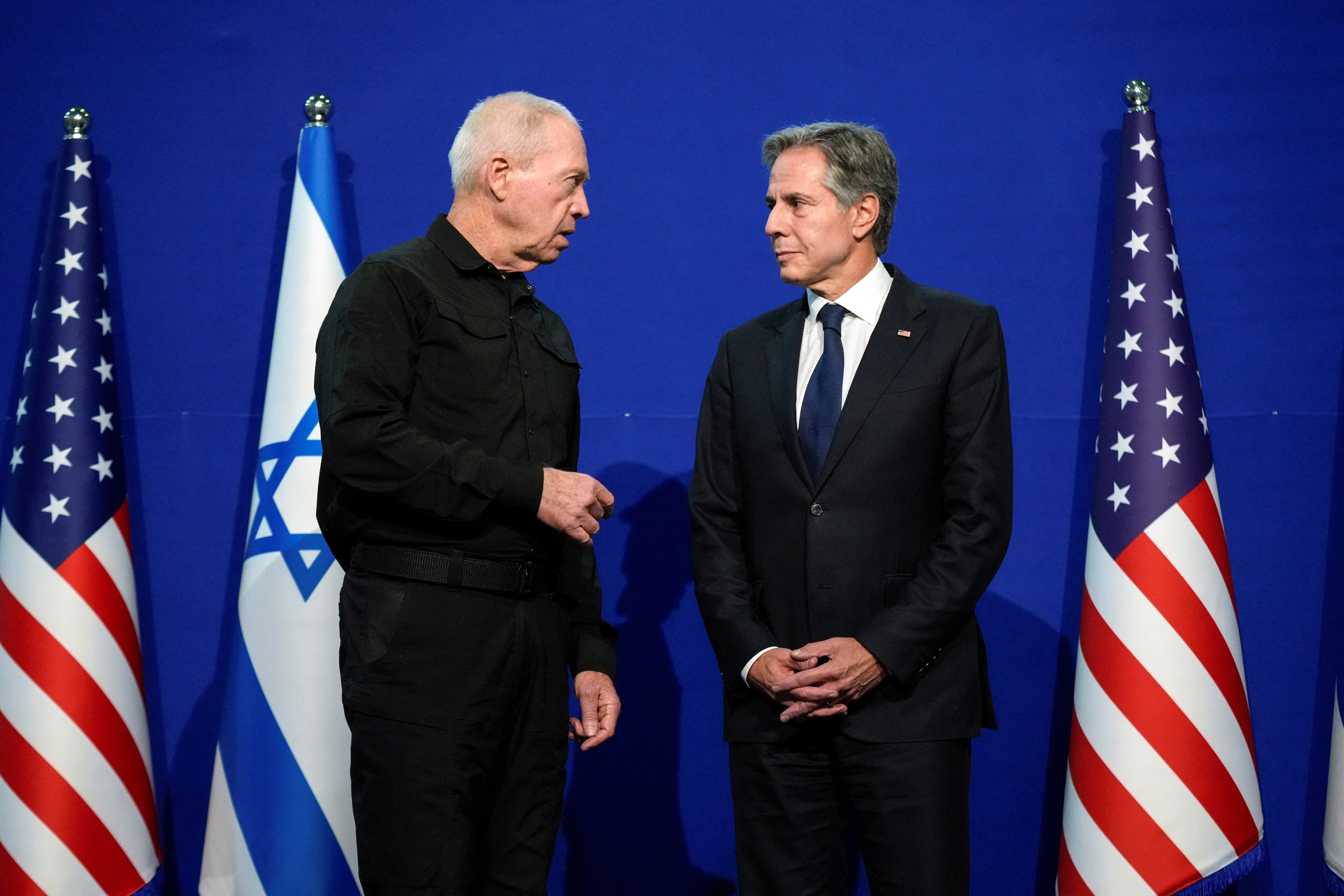 U.S. Secretary of State Antony Blinken speaks with Israeli Defense Minister Yoav Gallant as they make brief statements to the media at The Kirya, Israel's Ministry of Defense, in Tel Aviv, Israel October 16, 2023.