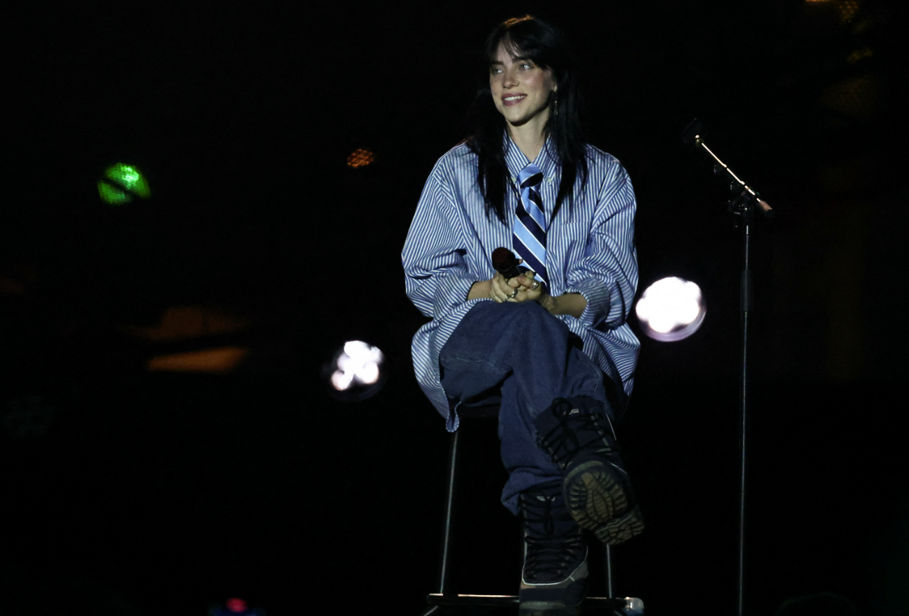 Billie Eilish smiles from the stage during the "Power Our Planet: Live in Paris" concert at the Champ de Mars on the sidelines of the Summit for a "New Global Financial Pact" in Paris, France, June 22, 2023.