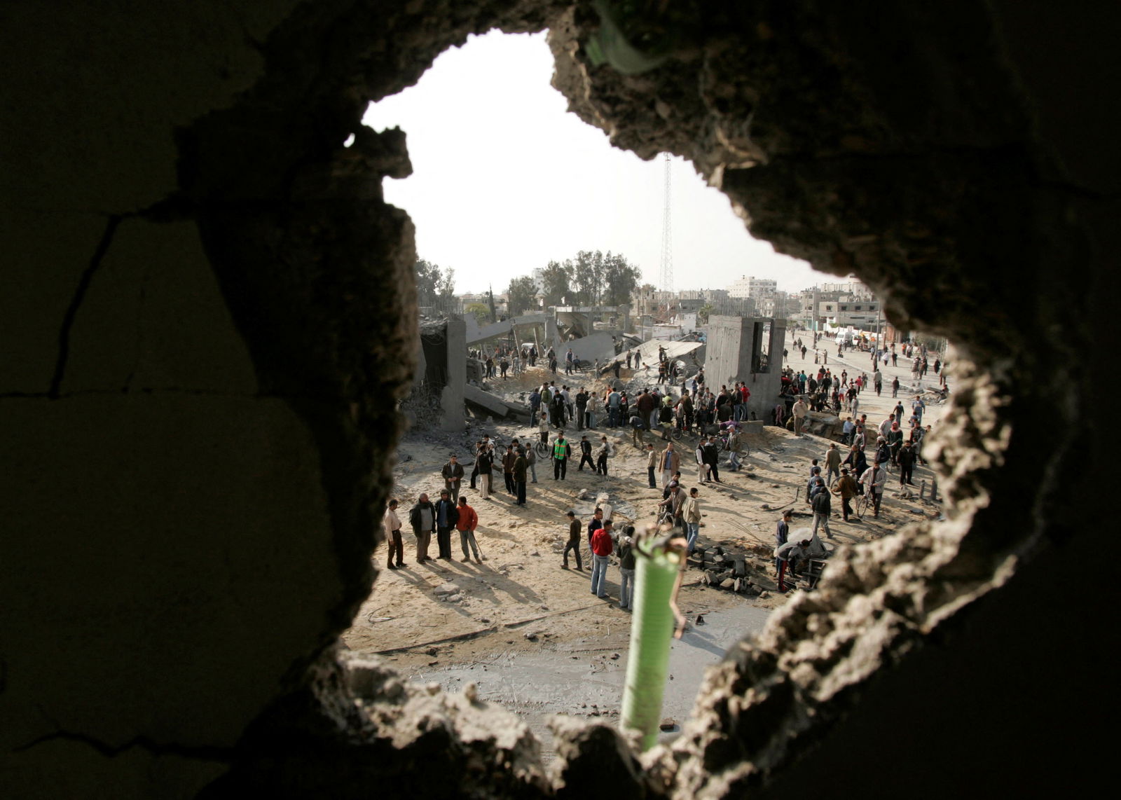Palestinians inspect Badr mosque after witnesses said it was bombed by Israeli military aircraft on Saturday, in the southern Gaza Strip March 2, 2008. 