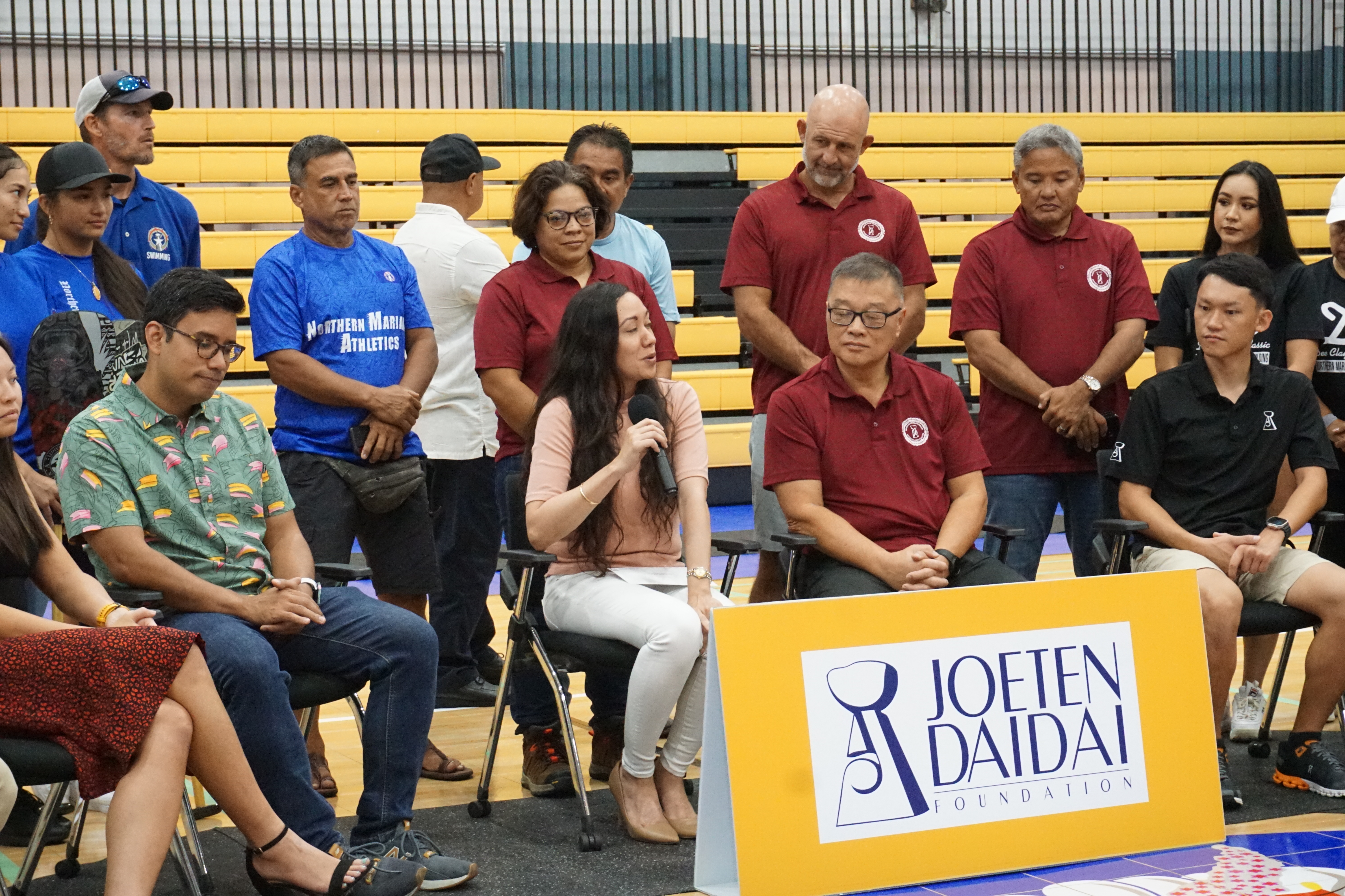 Joeten Daidai Foundation's Executive Director Patty Palacios shares a few words during a sponsorship ceremony at the Ada gym on Friday.