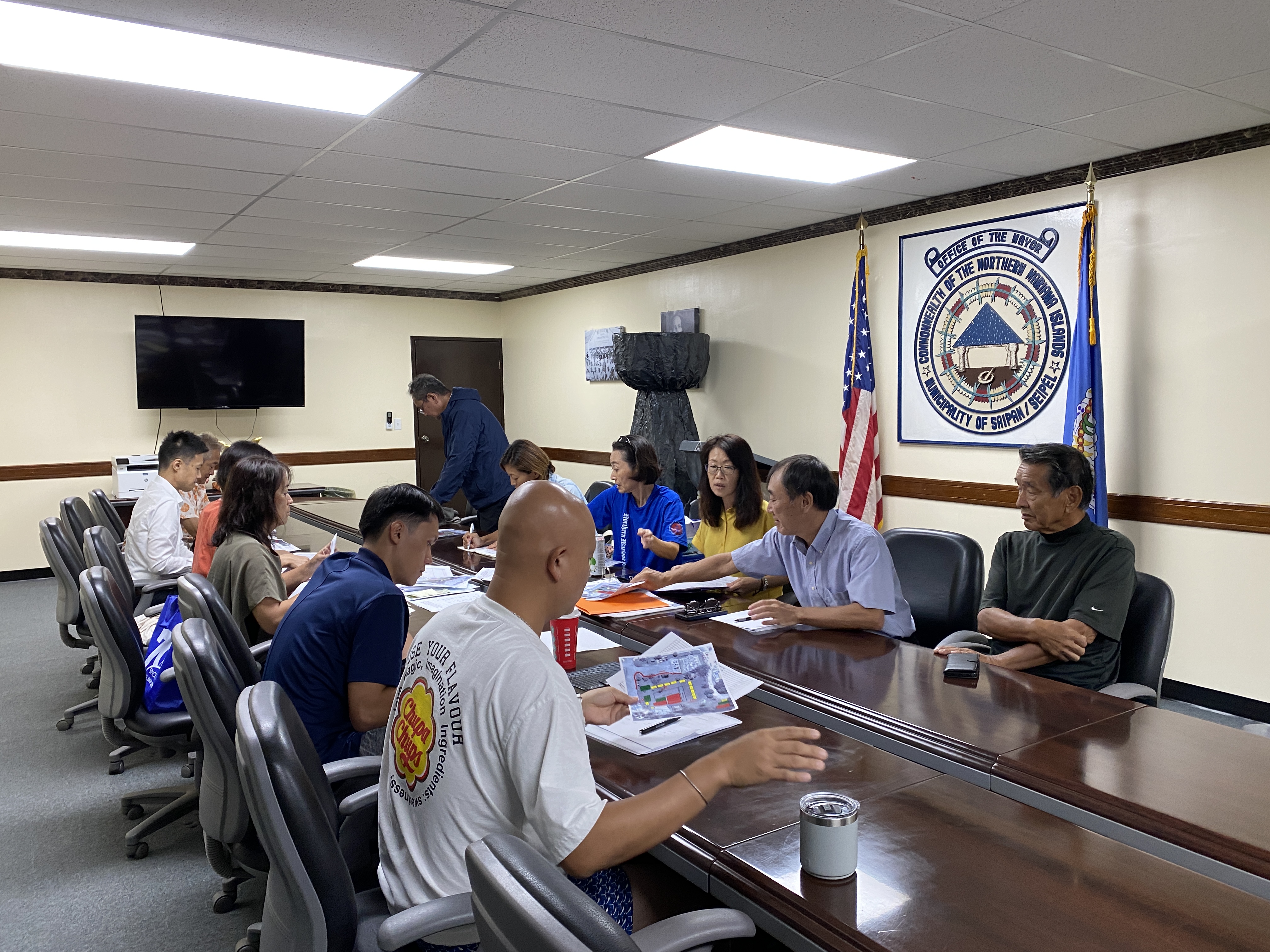 Hiroko Tenorio meets with the rest of the board members of the Japanese Society of the Northern Mariana Islands at the Saipan Mayor’s Office.