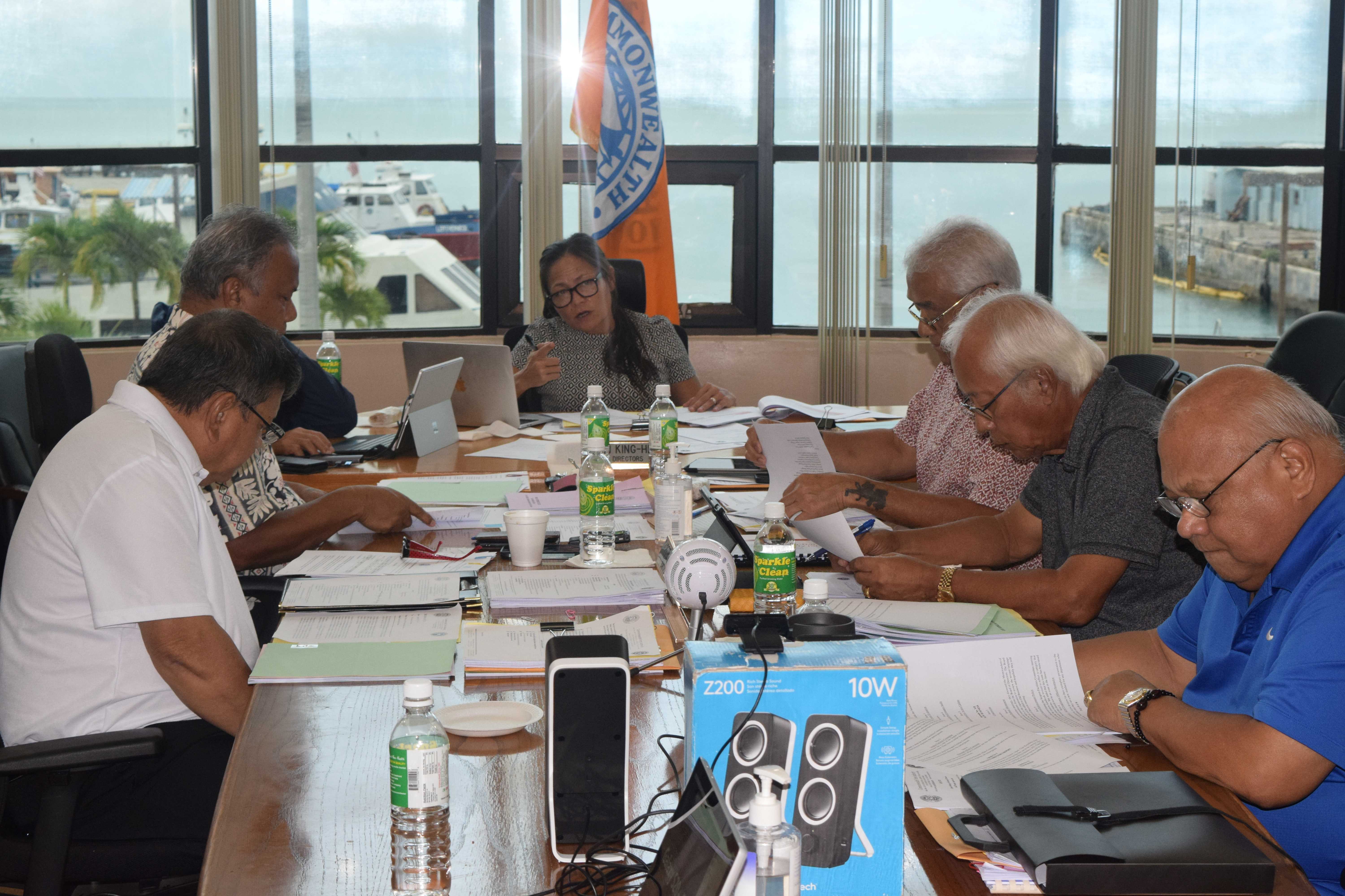 Commonwealth Ports Authority Board Chairwoman Kimberlyn King-Hinds, center, talks about the master concession with DFS prior to a roll-call vote on Sept. 29, 2023, in the Ports of Saipan conference room.