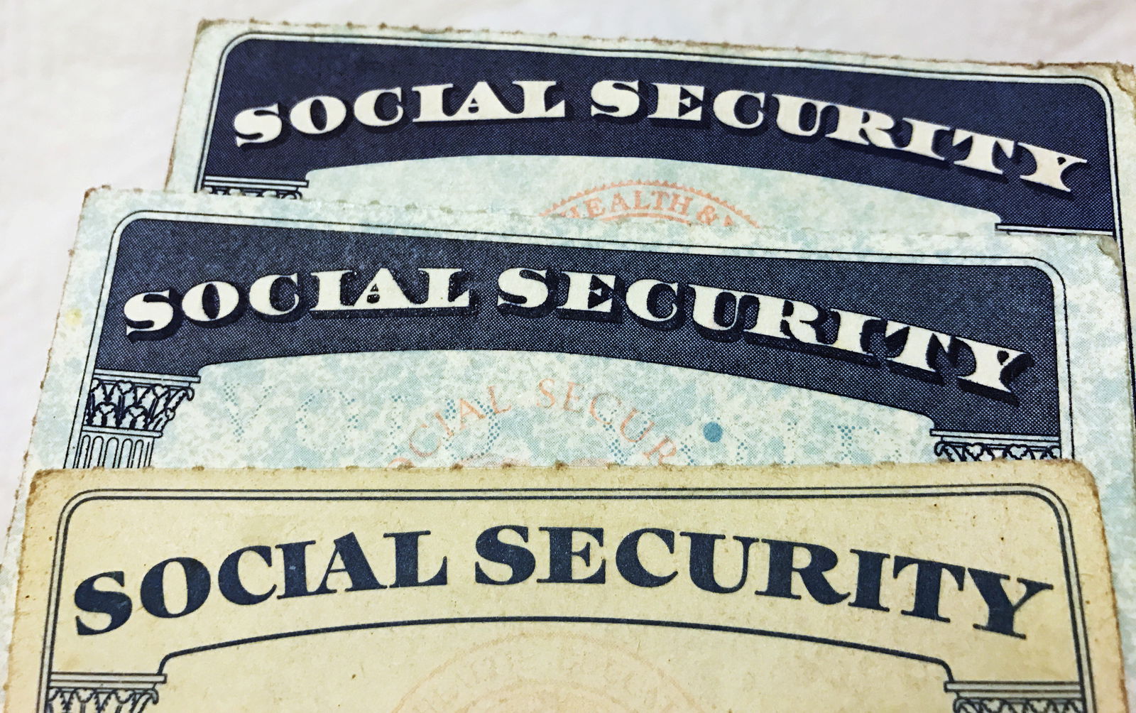 FILE PHOTO: U.S. Social Security card designs over the past several decades are shown in this photo illustration taken in Toronto, Canada on January 7, 2017. REUTERS/Hyungwon Kang/File Photo