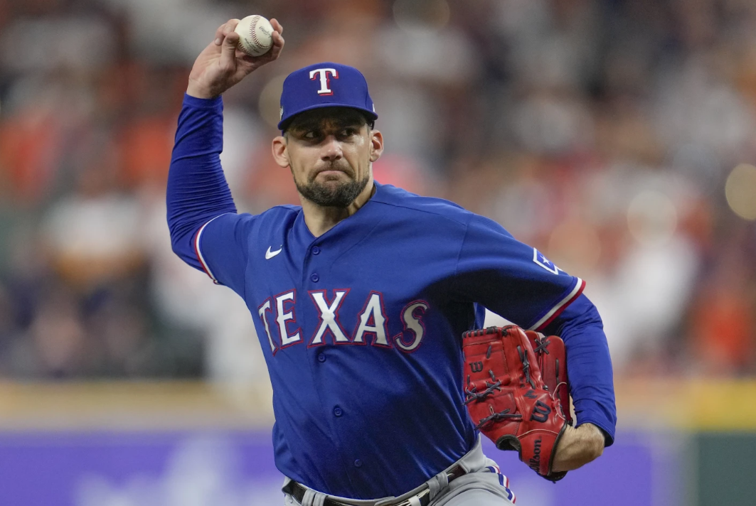 Texas Rangers starting pitcher Nathan Eovaldi throws during the first inning of Game 6 of the AL Championship Series against the Houston Astros Sunday, Oct. 22, 2023 in Houston.