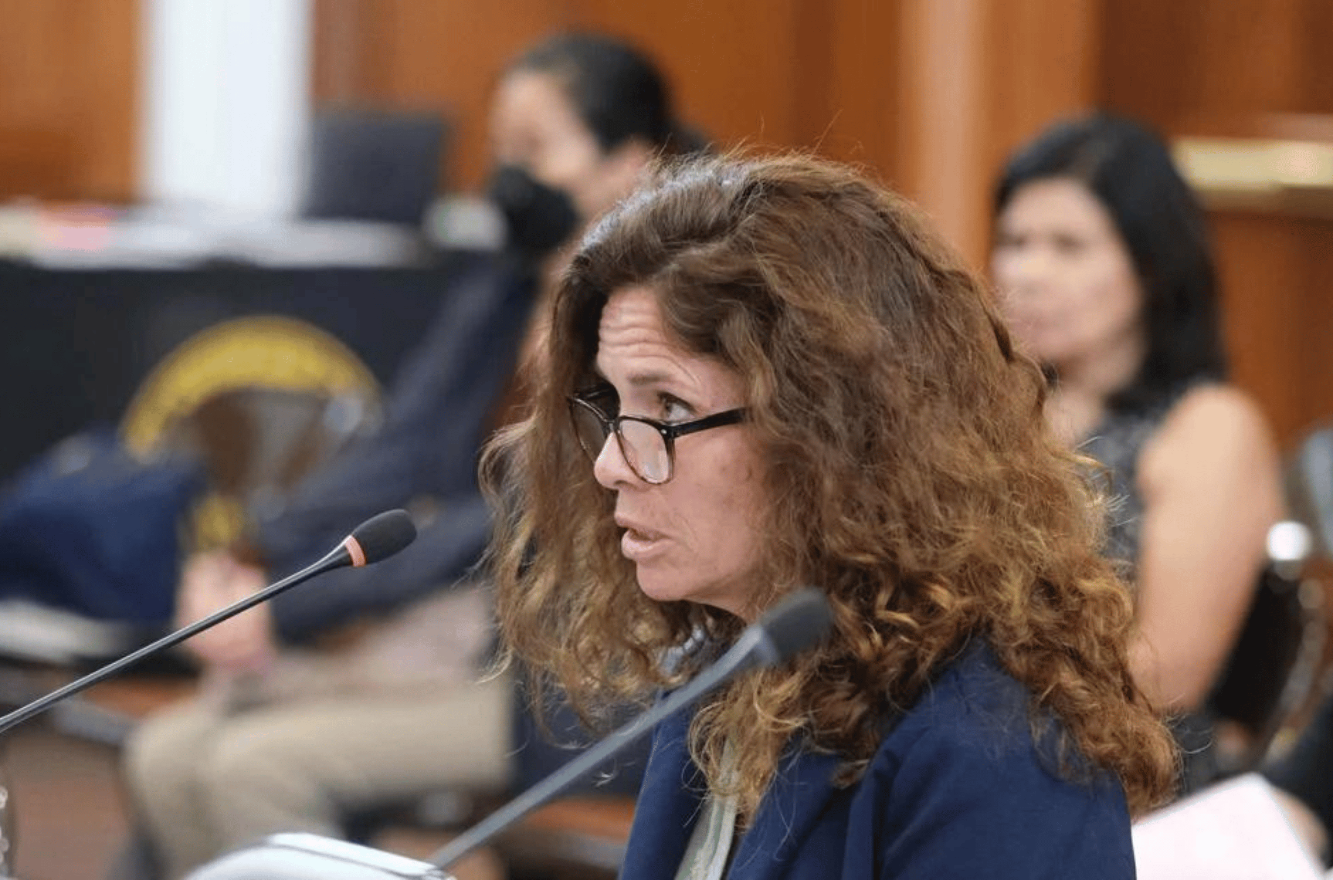 Heather Zona, acting chief prosecutor for the Office of the Attorney General, speaks during a public hearing at the Guam Congress Building on April 19, 2023.