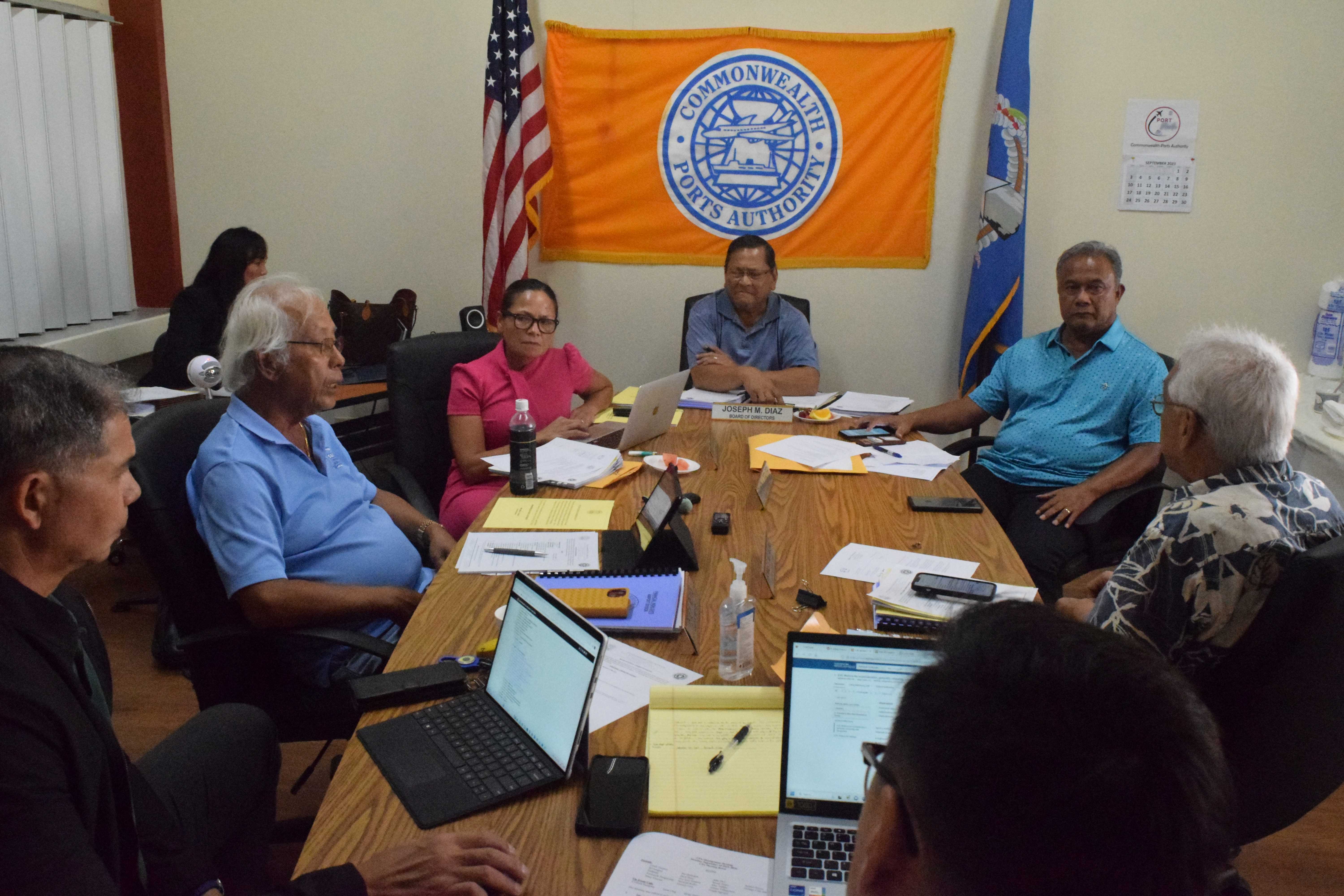 Commonwealth Ports Authority board member Pete P. Reyes, second left, speaks as Chairwoman Kimberlyn King-Hinds, third left, Personnel Committee Chairman Joseph Diaz, center, board members Ramon A. Tebuteb, second right, Thomas Villagomez, right, and board legal counsel Robert T. Torres, left, listen during a personnel committee meeting on Thursday. 