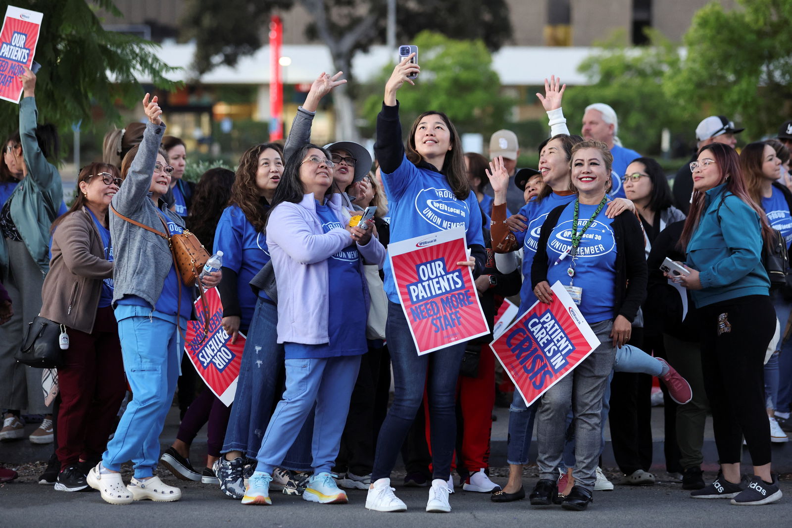 Healthcare workers on strike gather, as a coalition of Kaiser Permanente Unions representing 75,000 healthcare workers at Kaiser Permanente start a three day strike across the United States over a new contract, in San Diego, California, U.S. October 4, 2023. 