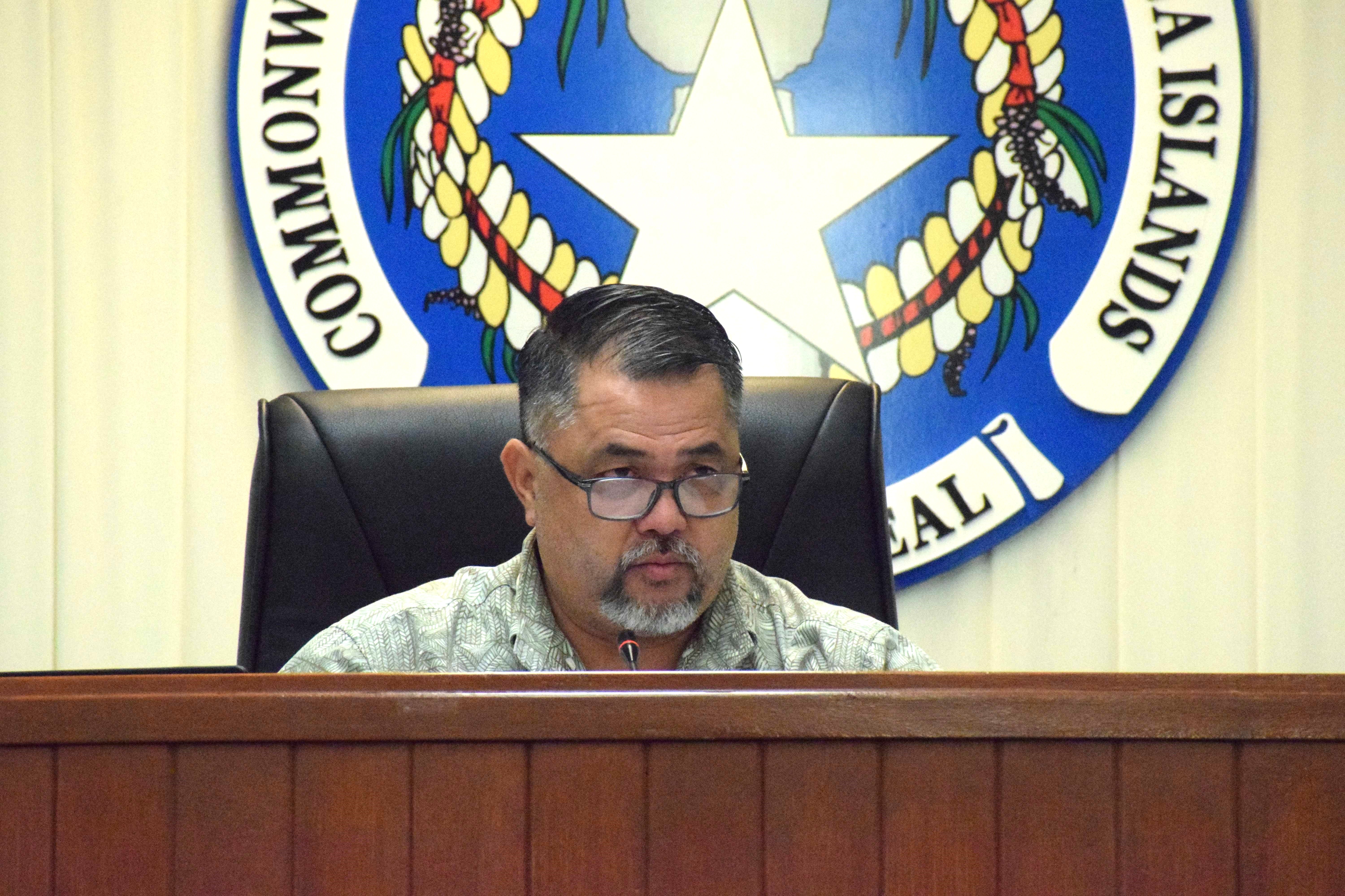 Rep. Ralph Yumul, who chairs the Special Committee on Federal Assistance & Disaster-Related Funding, presides overs a meeting in the House chamber.