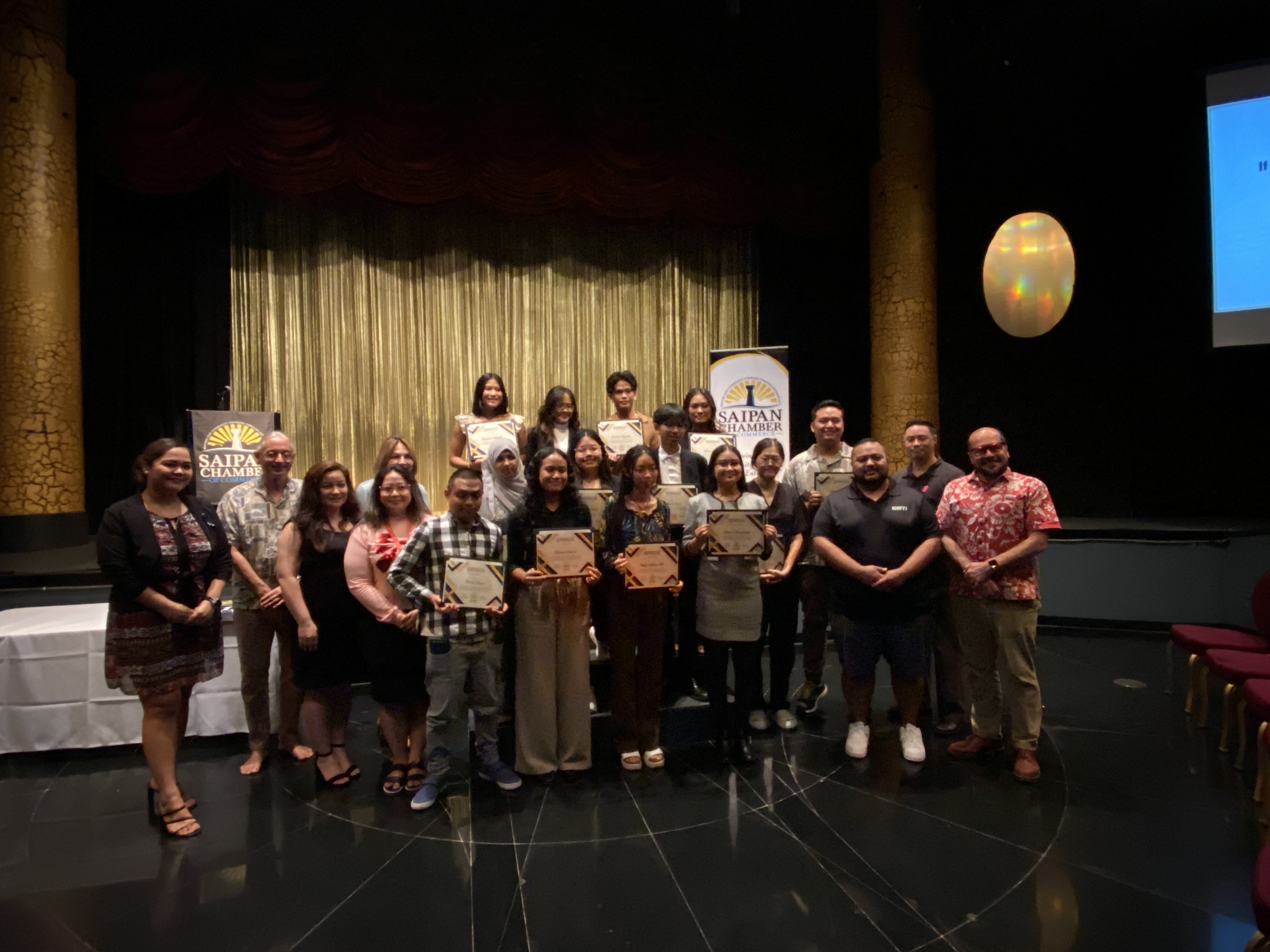 A group photo of NMC and NMTech students who received scholarships from the Saipan Chamber of Commerce.