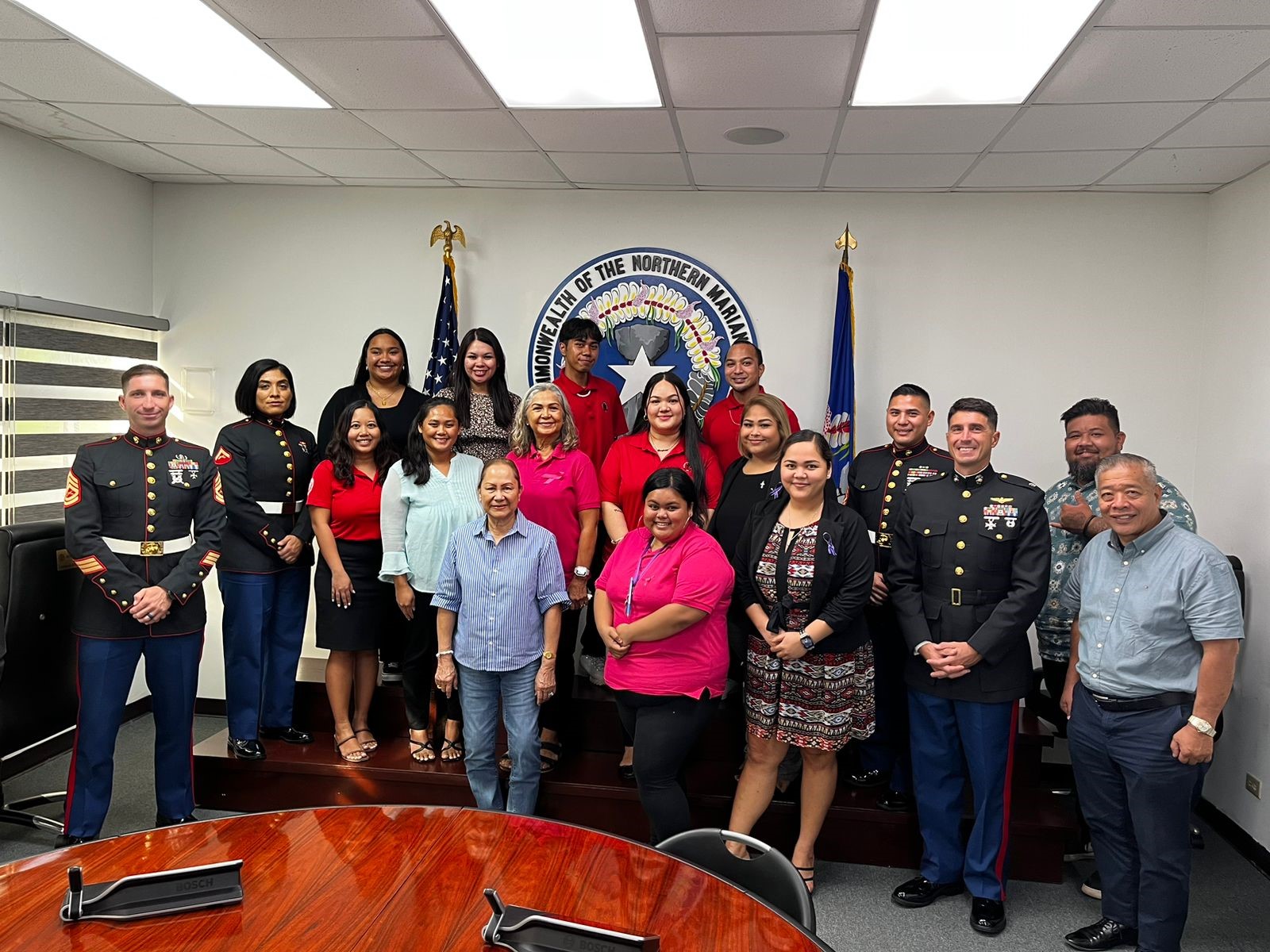 Marine Corps Base Camp Blaz officers pose for a photo with first lady Wella Palacios and representatives of the Saipan Chamber of Commerce, the Commonwealth Bureau of Military Affairs, the CNMI Women’s Association and the Associated Students of Northern Marianas College at the governor’s office on Capital Hill.