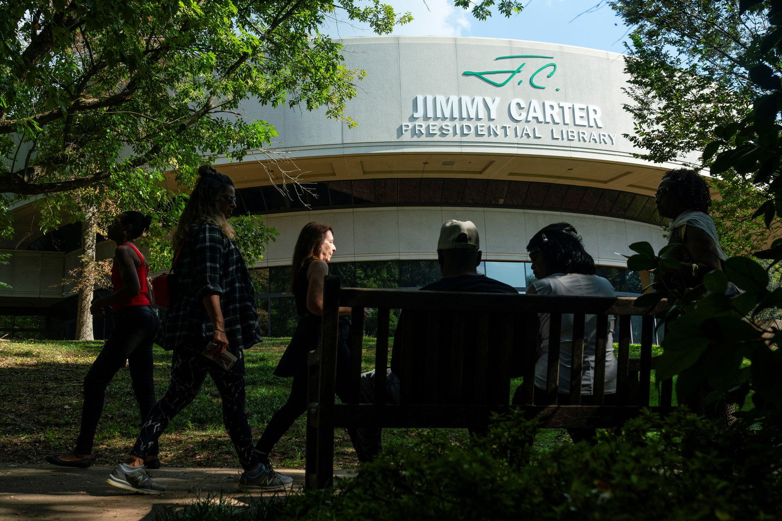 People wander the grouds of the Carter Presidential Center at a public birthday party held a day before former U.S. President Jimmy Carter turns 99 years old, at the Jimmy Carter Presidential Library and Museum in Atlanta, Georgia, U.S. September 30, 2023. 