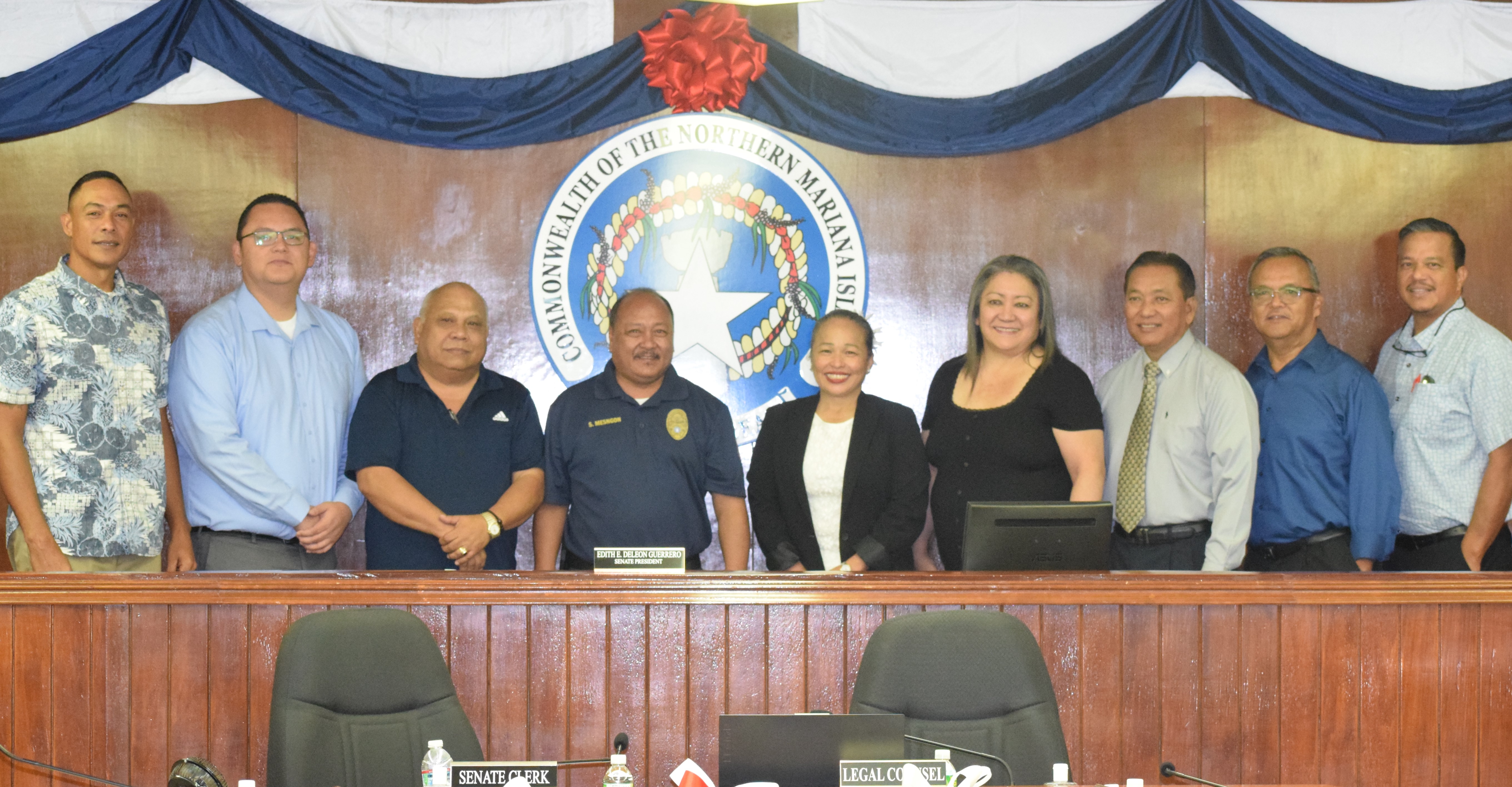 New Commonwealth Ports Authority board members Dolores P. Kiyoshi, fifth left, and Steve Mesngon, fourth left, pose for a photo with senators and CPA board member Antonio Cabrera, 3rd left, in the Senate chamber on Tuesday. Not in photo is Jose Ayuyu, whose nomination to the CPA board was also confirmed by the Senate.