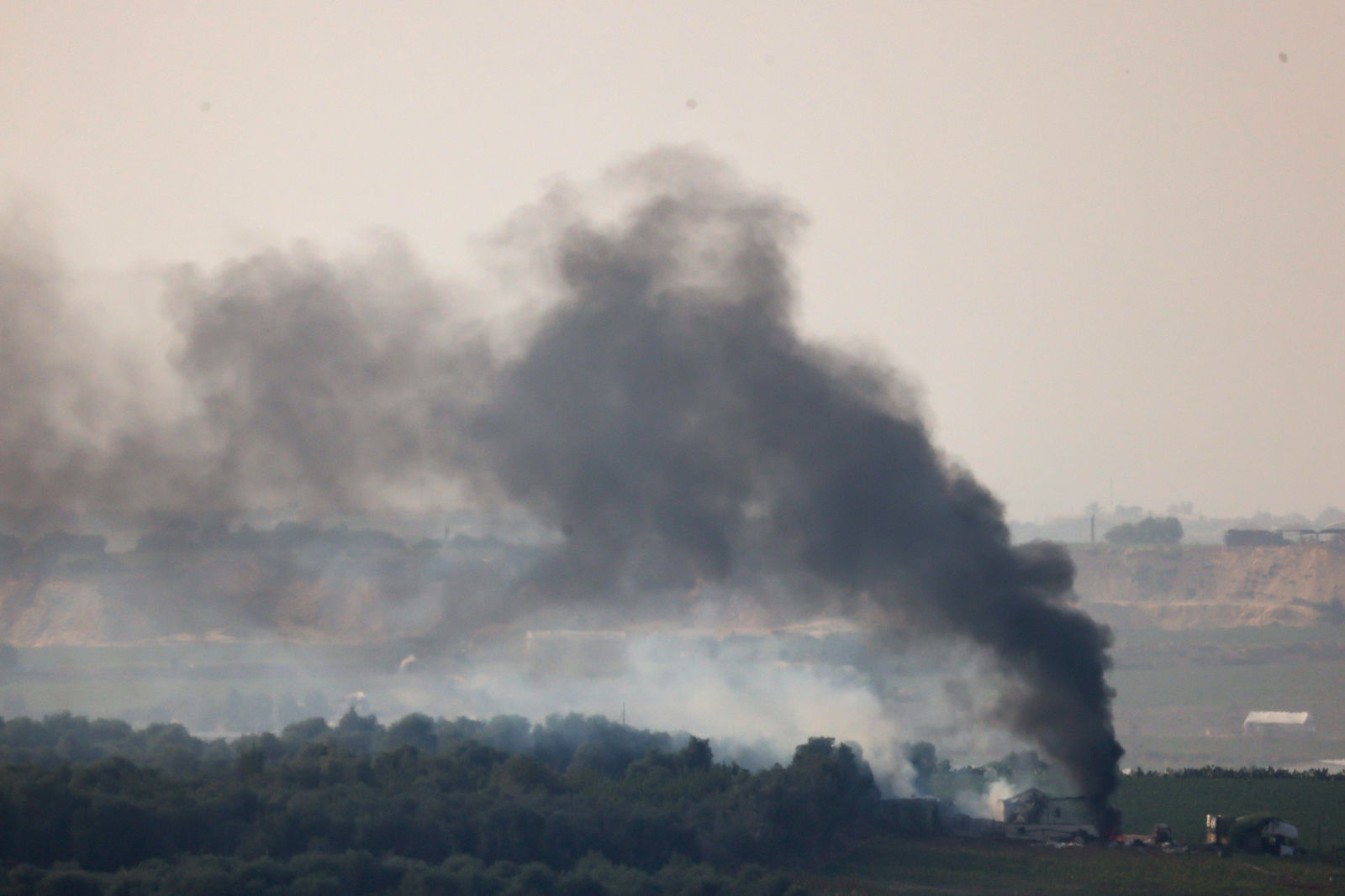 Smoke rises over Gaza, as seen from Israel's border with Gaza, in southern Israel October 28, 2023. 