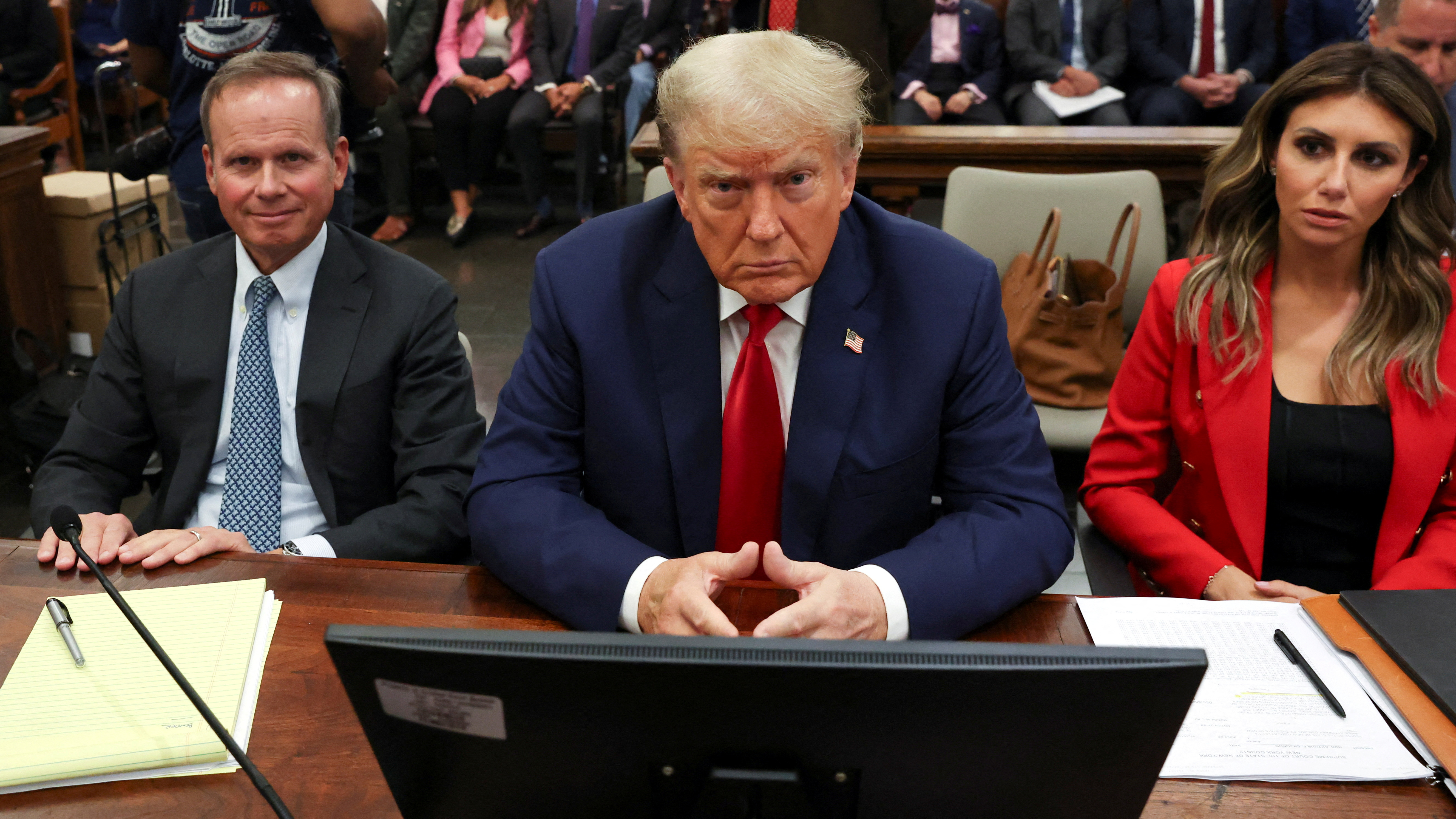 Former U.S. President Donald Trump attends the trial of himself, his adult sons, the Trump Organization and others in a civil fraud case brought by state Attorney General Letitia James, at a Manhattan courthouse, in New York City, U.S., October 3, 2023. 