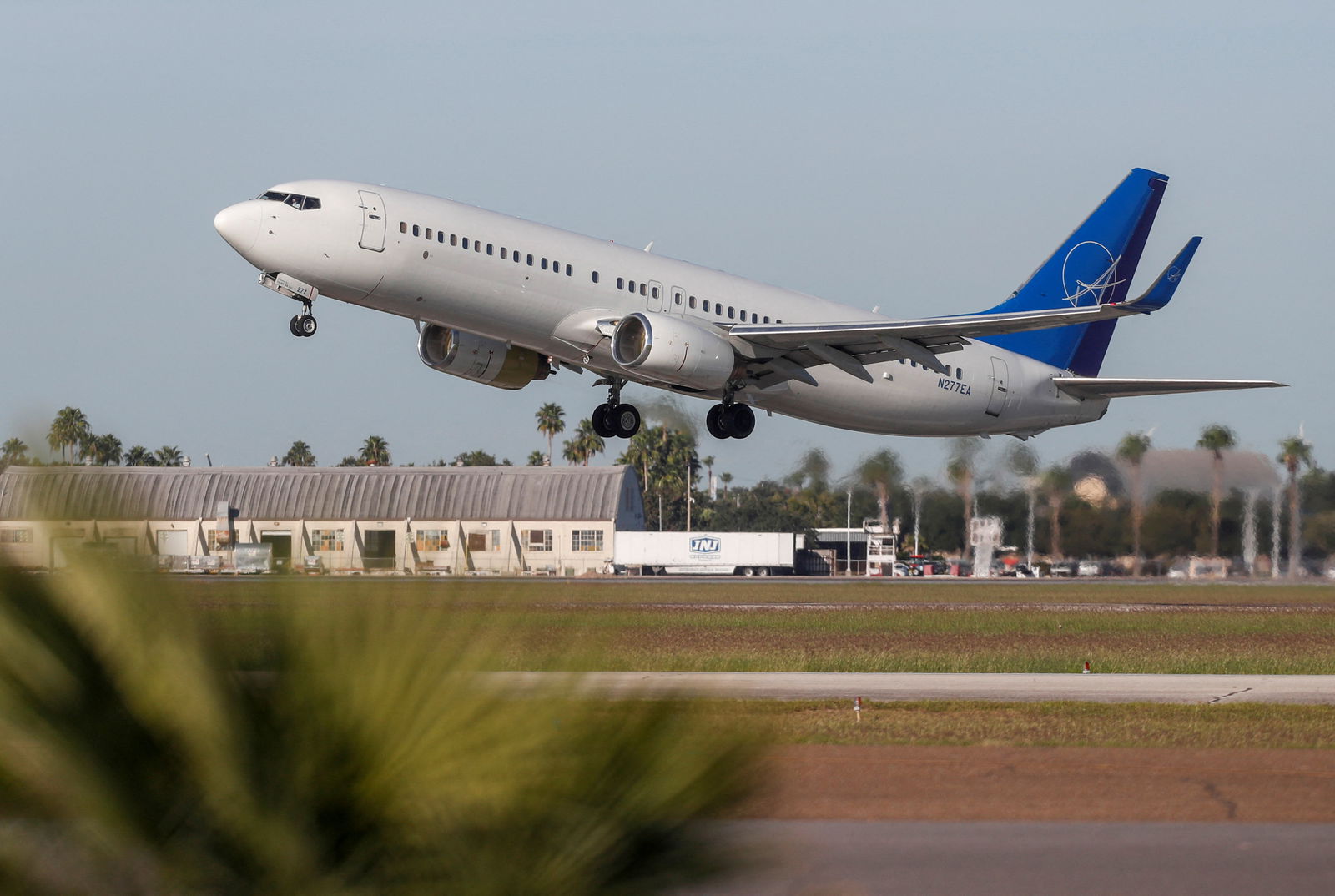 An aircraft carrying Venezuelan migrants, who will be repatriated as part of an immigration enforcement process, departs from the Valley International Airport, in Harlingen, Texas, U.S. October 18, 2023. 