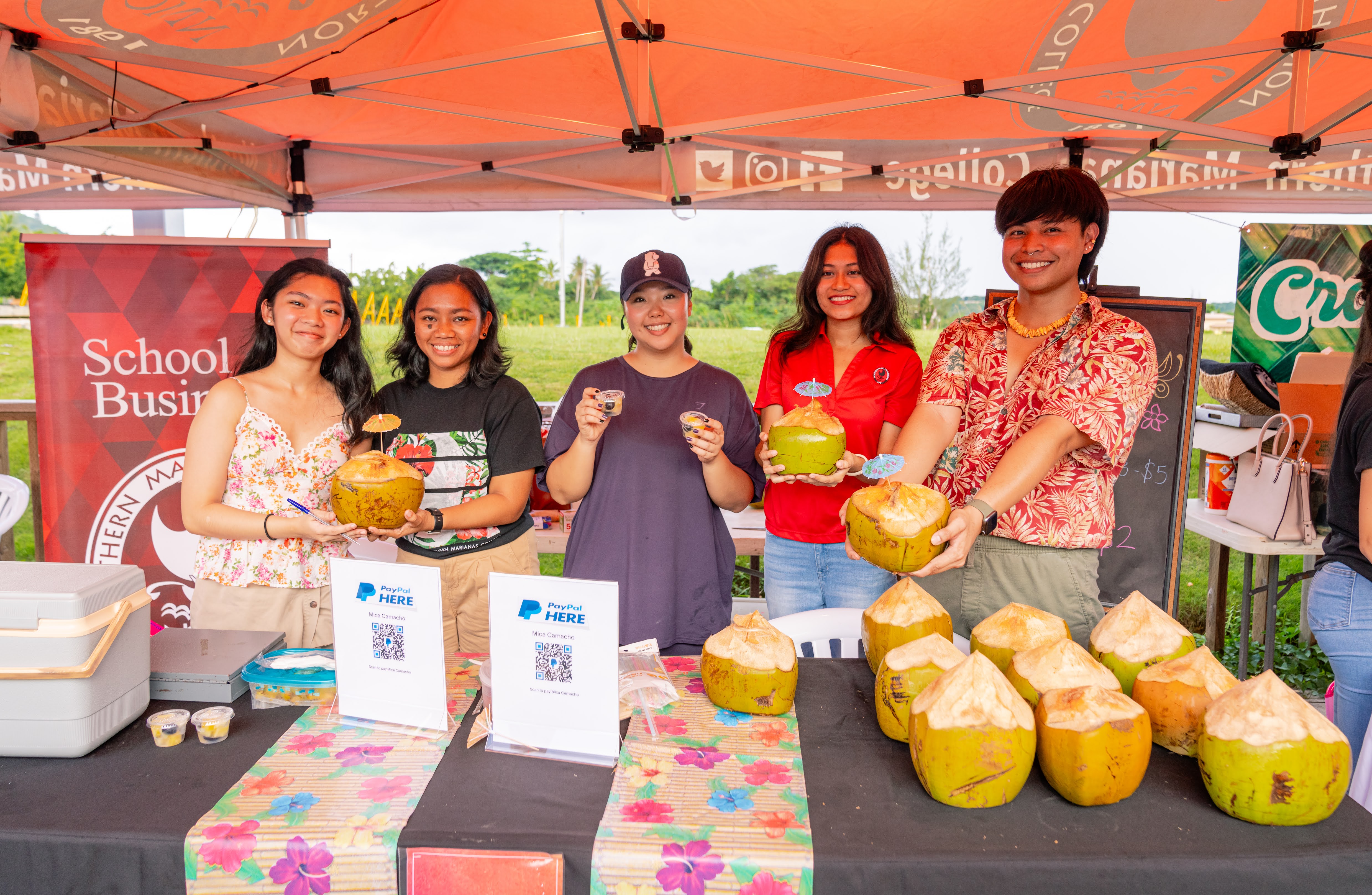 NMC Business Club sells fresh coconuts and fruit cups to participants of Cultural Night.