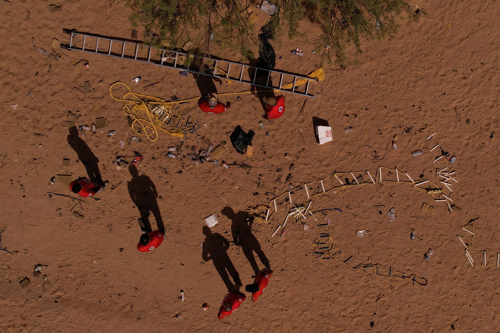 Stairs used by migrants to cross into the United States from Mexico sit in the desert near the border as members of Mexican immigrant welfare agency Grupo Beta patrol outside Ciudad Juarez, Mexico, September 15, 2023. REUTERS/Jose Luis Gonzalez
