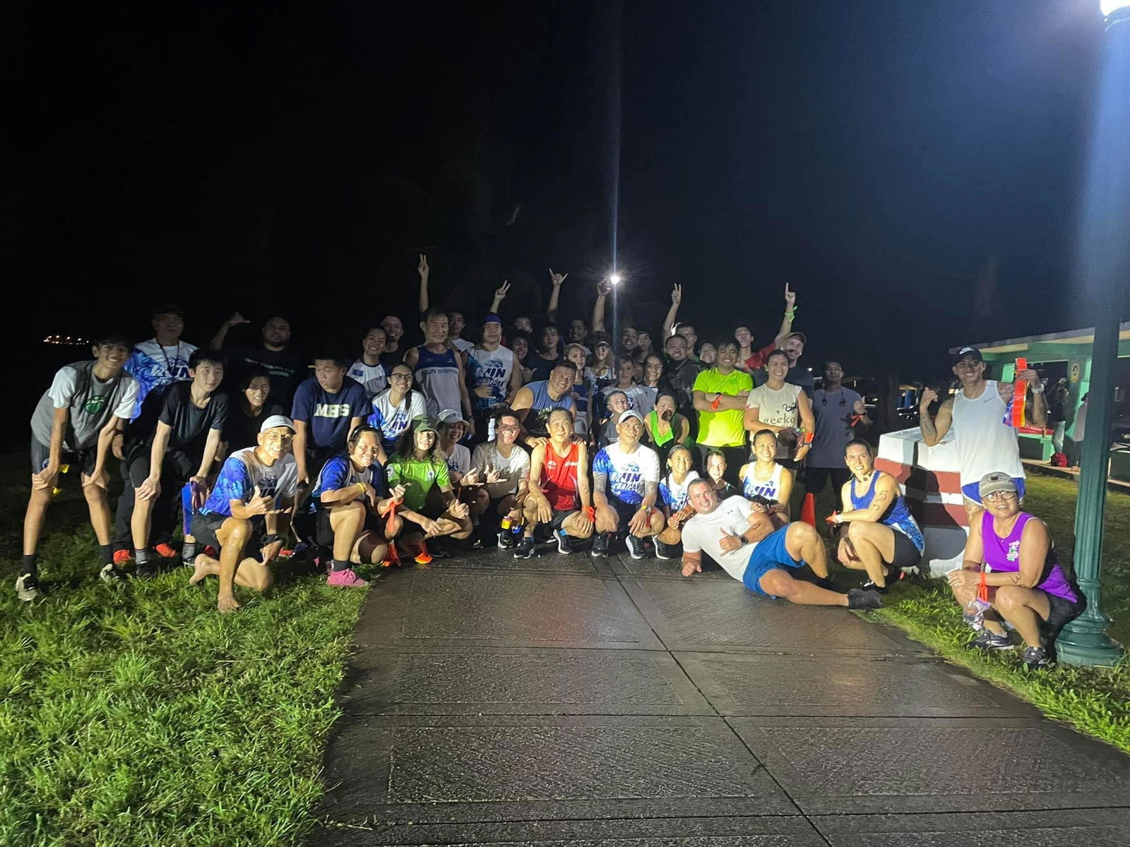 Participants pose for a photo after the inaugural Run Saipan Zombie 5K event on Beach Road in San Jose on Oct. 21, 2022.