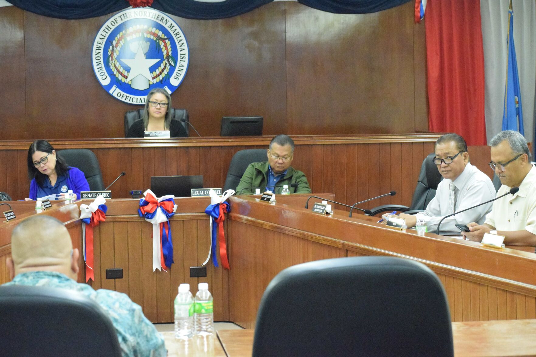 Senate President Edith Deleon Guerrero, Sen. Frank Cruz, and Sen. Paul A. Manglona listen to Office of Planning and Development engineer Mariano Iglesias during a Senate session on Friday.