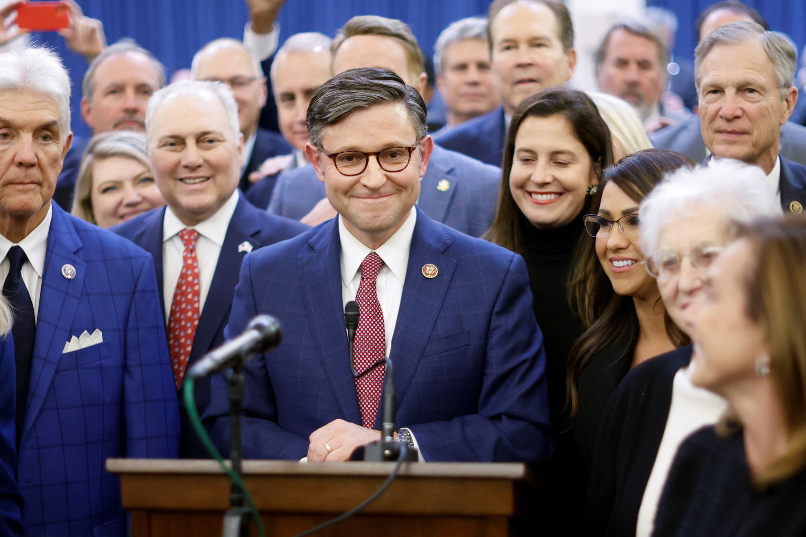 U.S. Representative Mike Johnson is surrounded by fellow members as he speaks to reporters after securing the nomination for House Speaker from the Republican conference on Capitol Hill in Washington, U.S. October 24, 2023. 