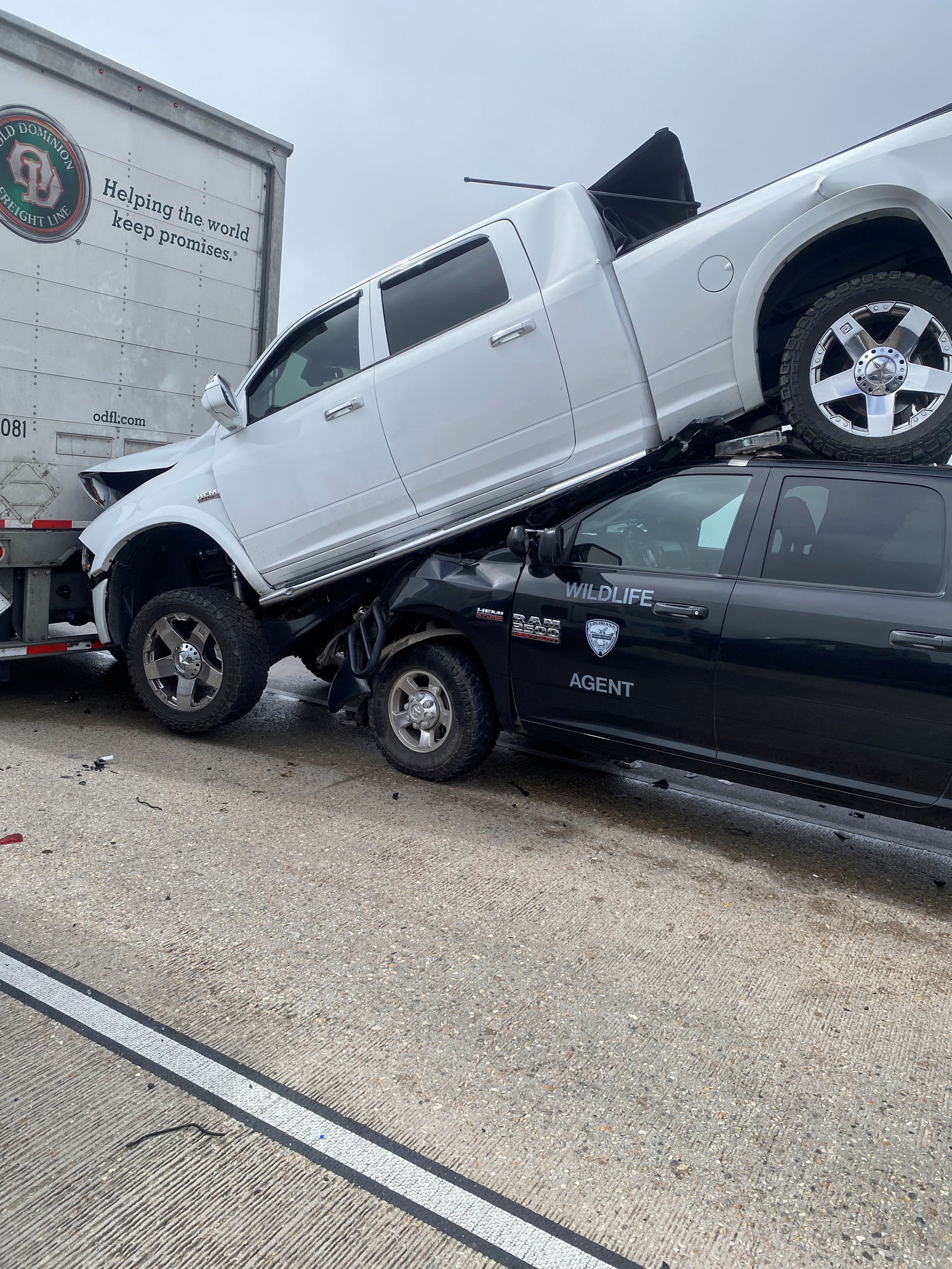 Crashed cars are seen along a street, following a vehicle pile-up due to a "super fog" aggravated by marsh fires, in Louisiana, U.S., October 23, 2023 in this picture obtained from social media. 