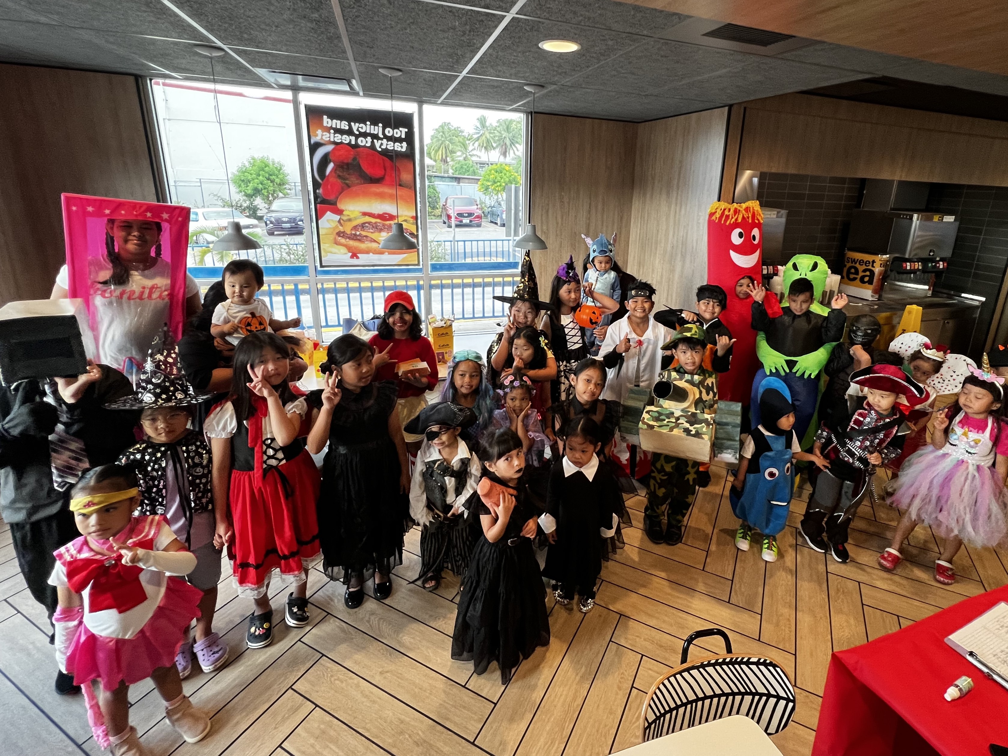 McDonald’s Halloween kids costume contest participants pose for a group photo.