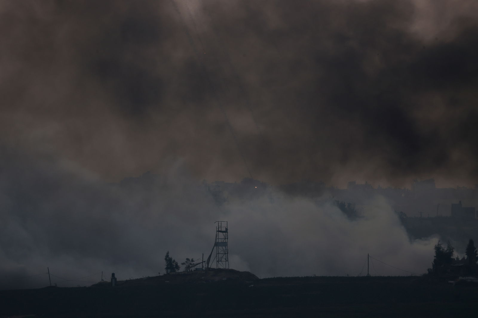 Smoke rises over Gaza, as seen from Israel's border with Gaza, in southern Israel October 28, 2023. 