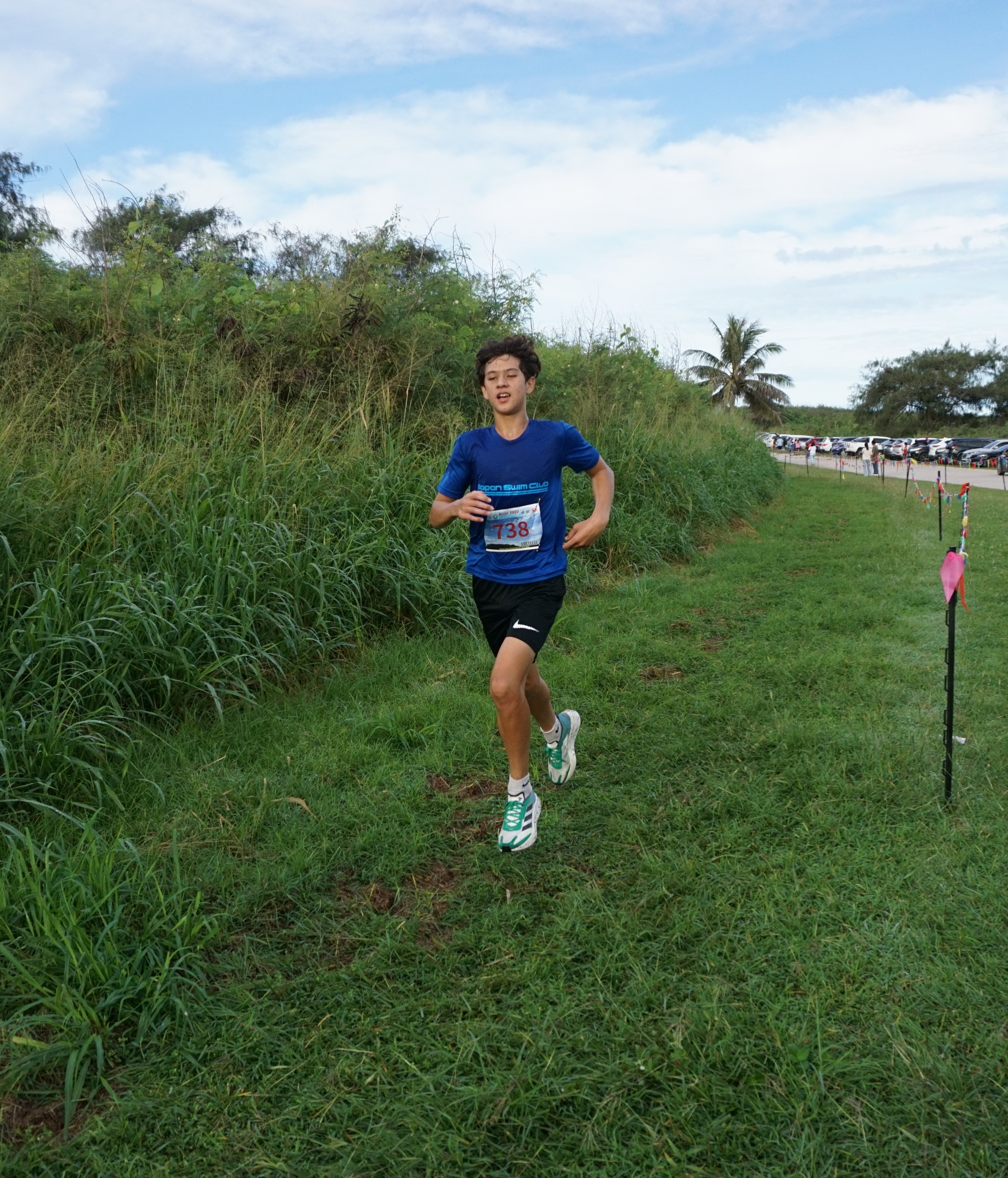 Marianas High School's Michael Miller finishes first in the high school category of the NMA-PSS All School Cross Country Series on Saturday at Banzai Cliff.
