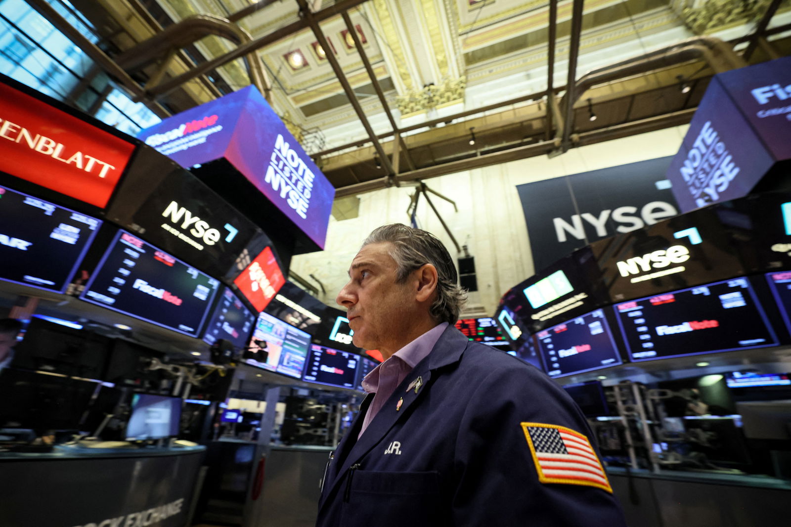 Traders work on the floor of the New York Stock Exchange in New York City, Aug. 15, 2023.