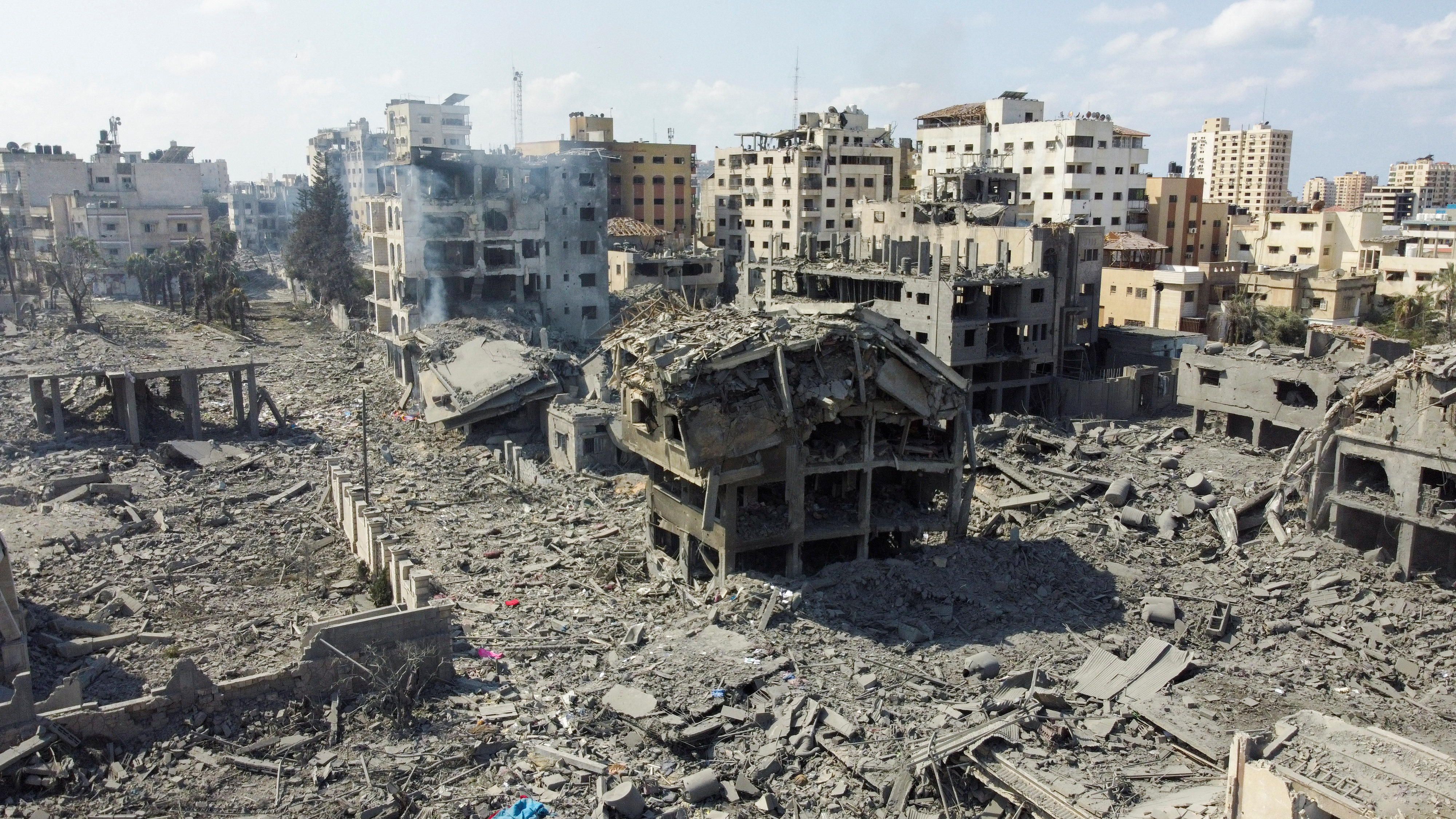 A view shows houses and buildings destroyed by Israeli strikes in Gaza City, October 10, 2023. REUTERS/Mohammed Salem