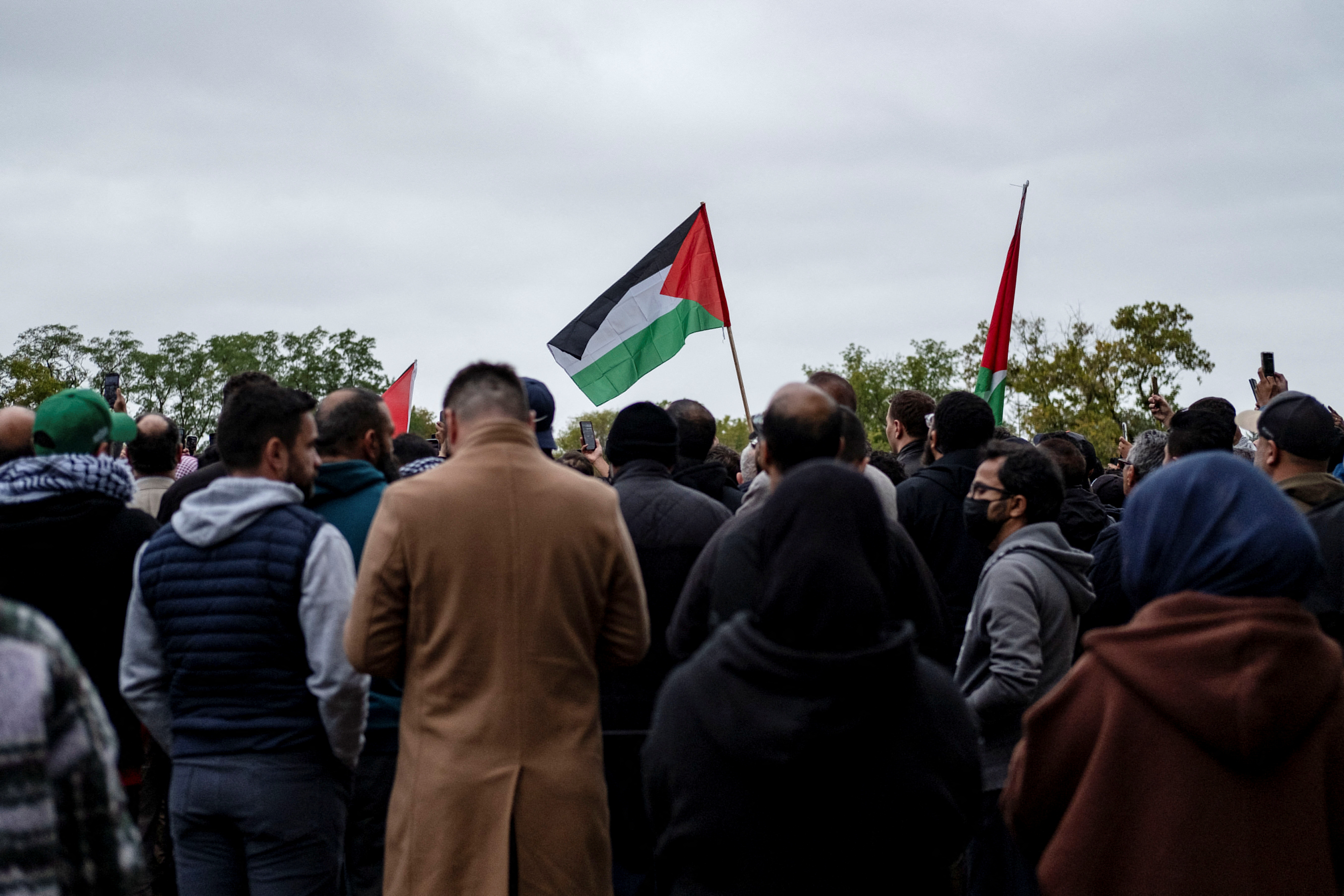 Mourners arrive at Parkholm Cemetery to attend the burial of Wadea Al-Fayoume, 6, a Muslim boy who according to police was stabbed to death in an attack that targeted him and his mother for their religion and as a response to the conflict between Israel and Hamas, in LaGrange, Illinois, U.S. October 16, 2023. 