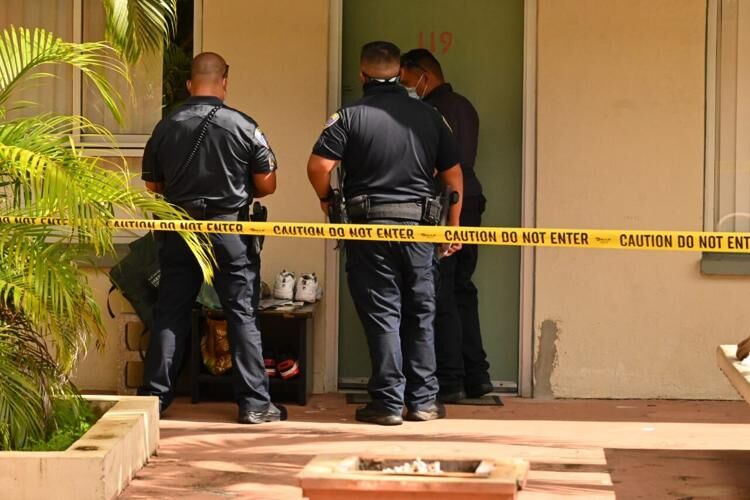 Officers with the Guam Police Department investigate the fatal stabbing of a 39-year-old woman on Sunday, June 6, 2021, at the Hotel Mai'ana in Tamuning. 