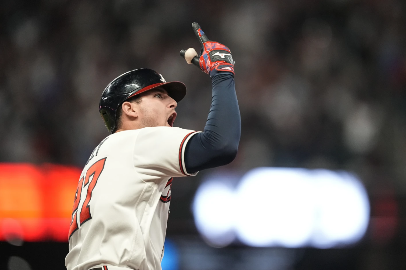 Atlanta Braves’ Austin Riley celebrates hitting a two-run homer in the eighth inning of Game 2 of a baseball NL Division Series against the Philadelphia Phillies, Monday, Oct. 9, 2023 in Atlanta.