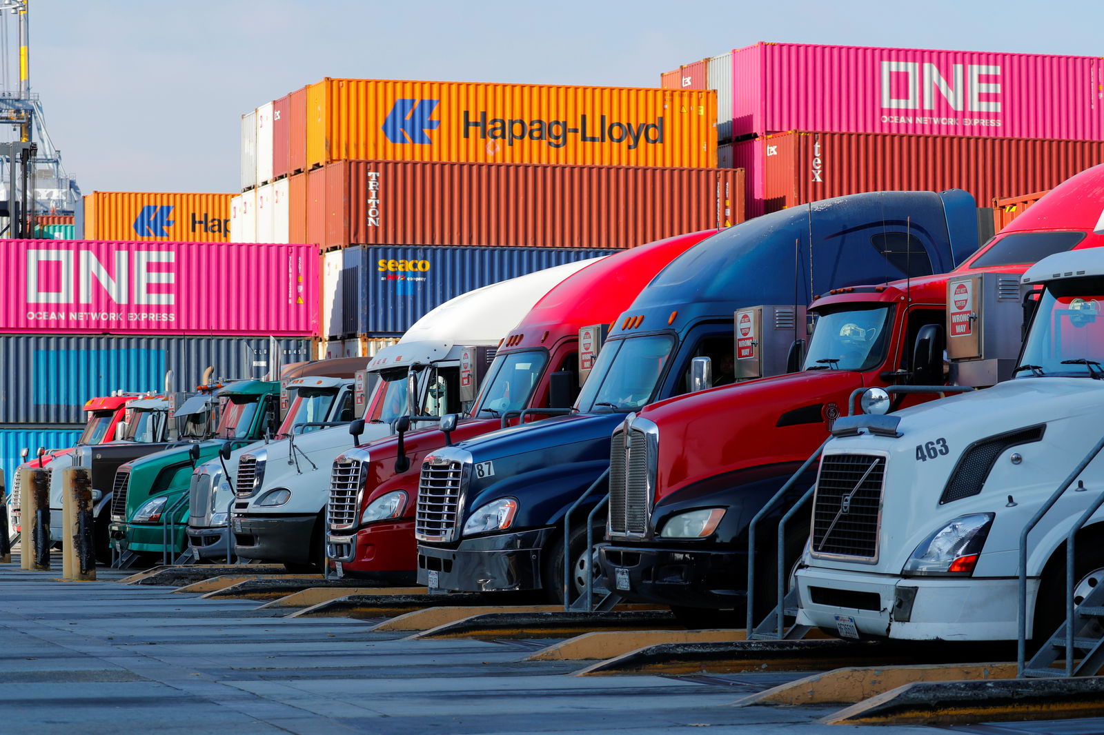 Trucks wait in line as they enter to pick up containers at Yusen Terminals (YTI) on Terminal Island at the Port of Los Angeles in Los Angeles, California, U.S., January 30, 2019. 