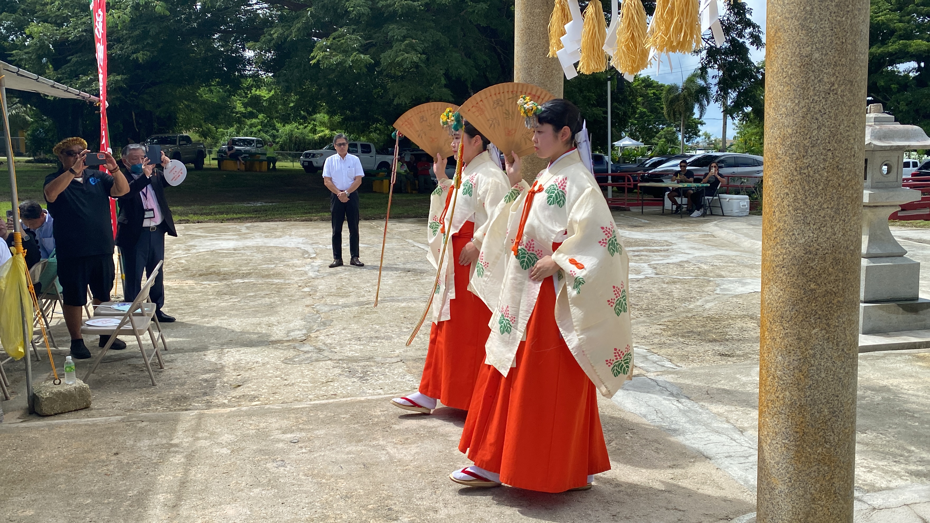 Two Katori Shrine officials make their entrance at the Saipan Katori Shrine.