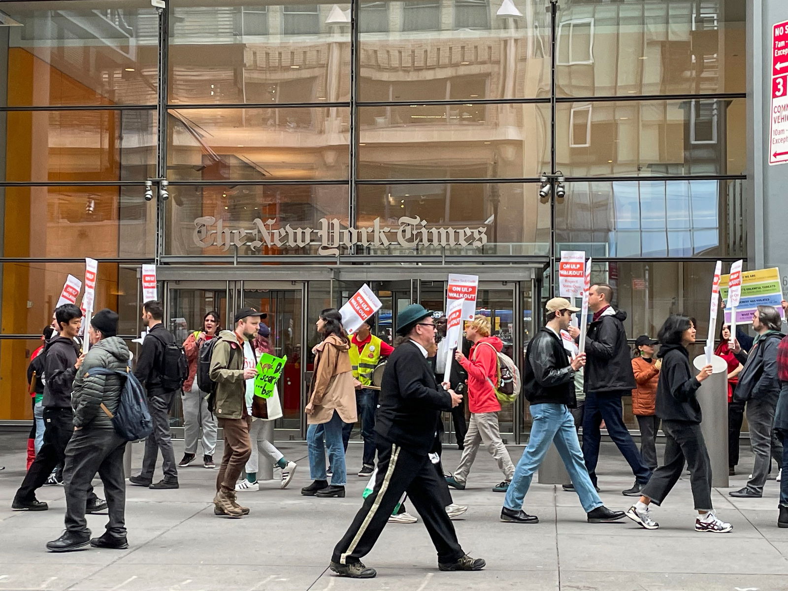 New York Times technology union members walk the picket line outside the company's headquarters, in New York City, U.S., October 30, 2023. 