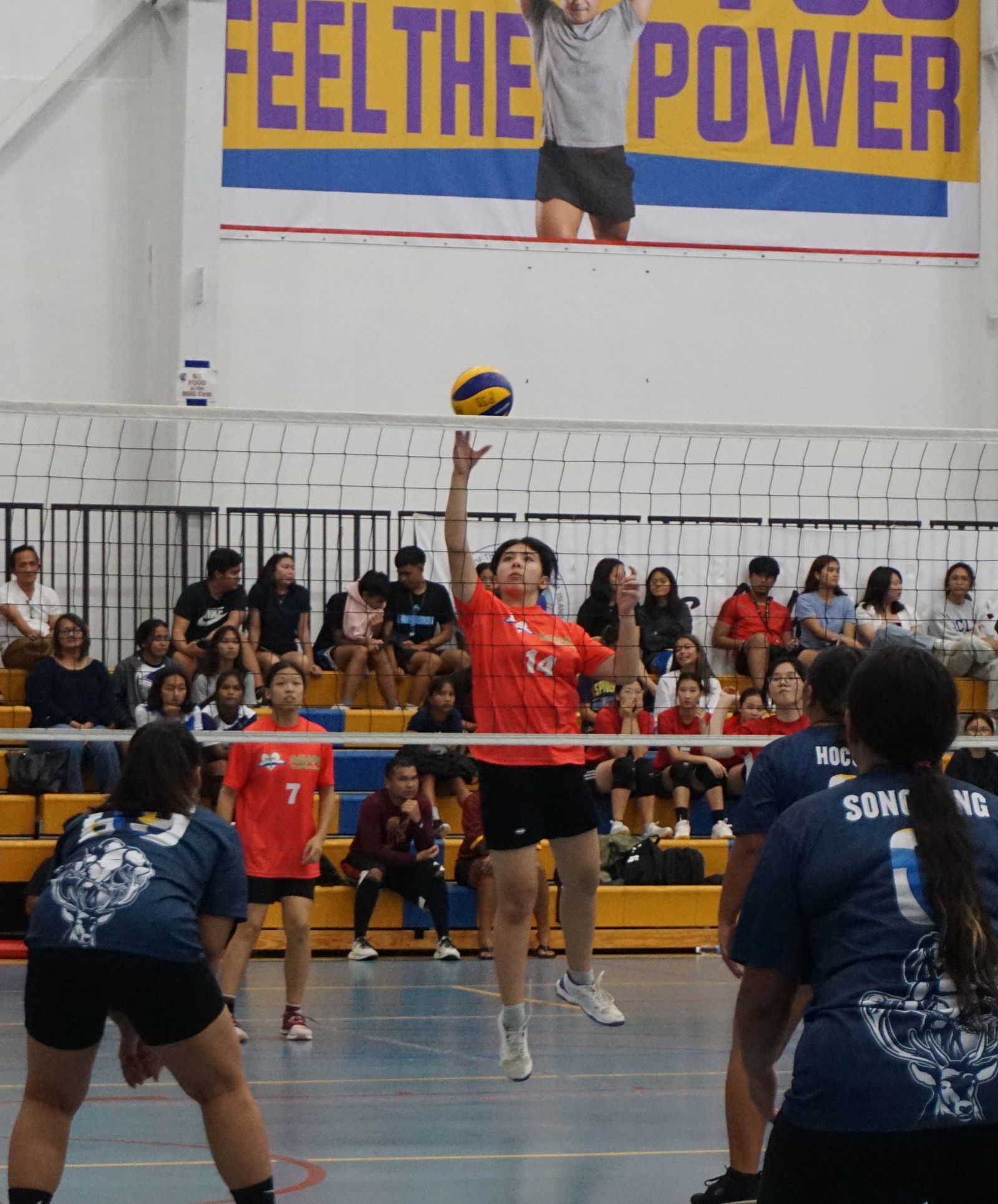 An Agape Christian School player extends for the spike return during a girls high school division game of the NMIVA-PSS Interscholastic Volleyball League at the Marianas High School gym.