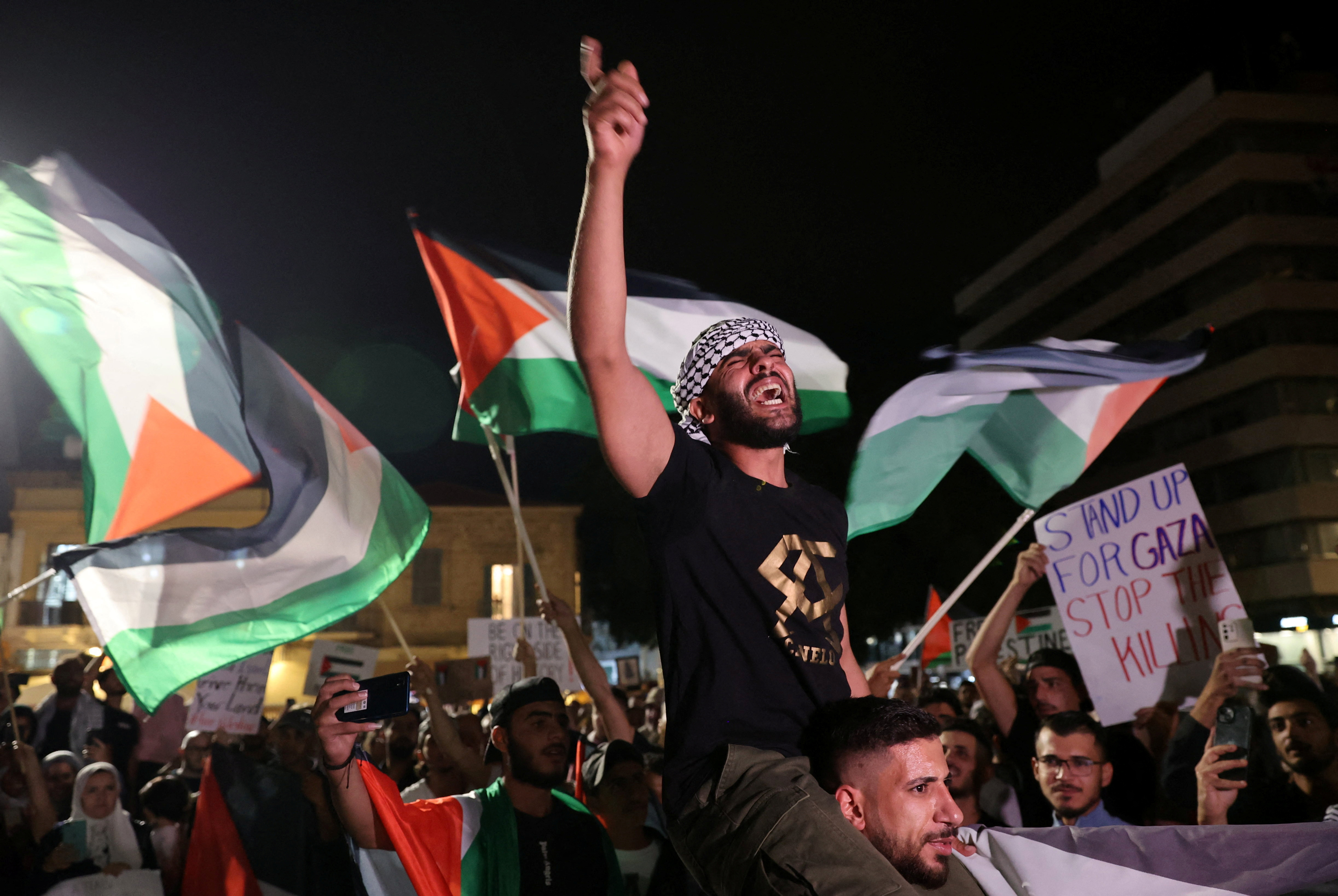 A Palestinian shouts slogans during an anti-war protest, as the ongoing conflict between Israel and the Palestinian Islamist group Hamas continues, in Nicosia, Cyprus October 20, 2023. 